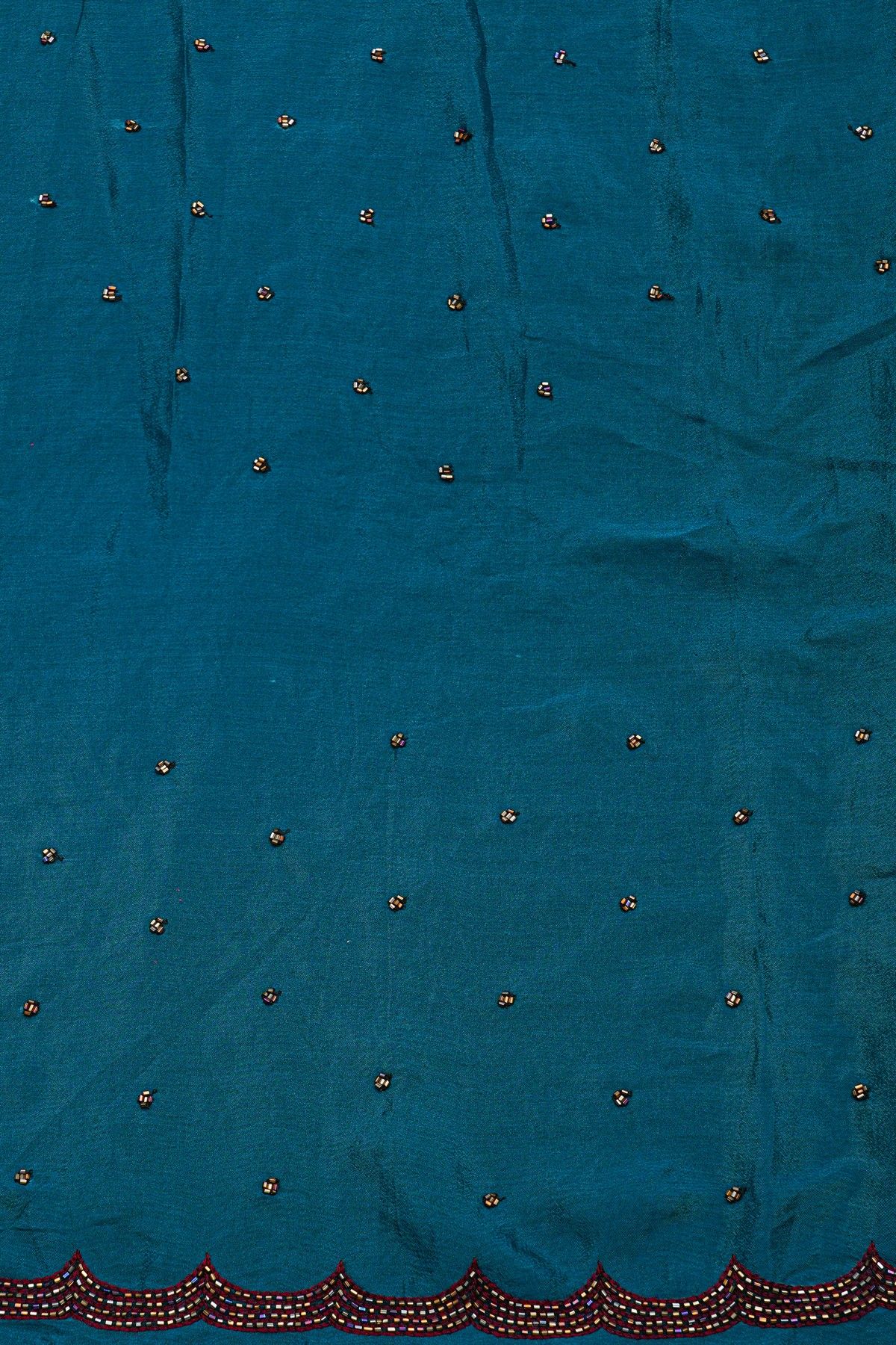 Fancy Georgette Peacock Green Saree With Weaves Design In Kardana Work Border