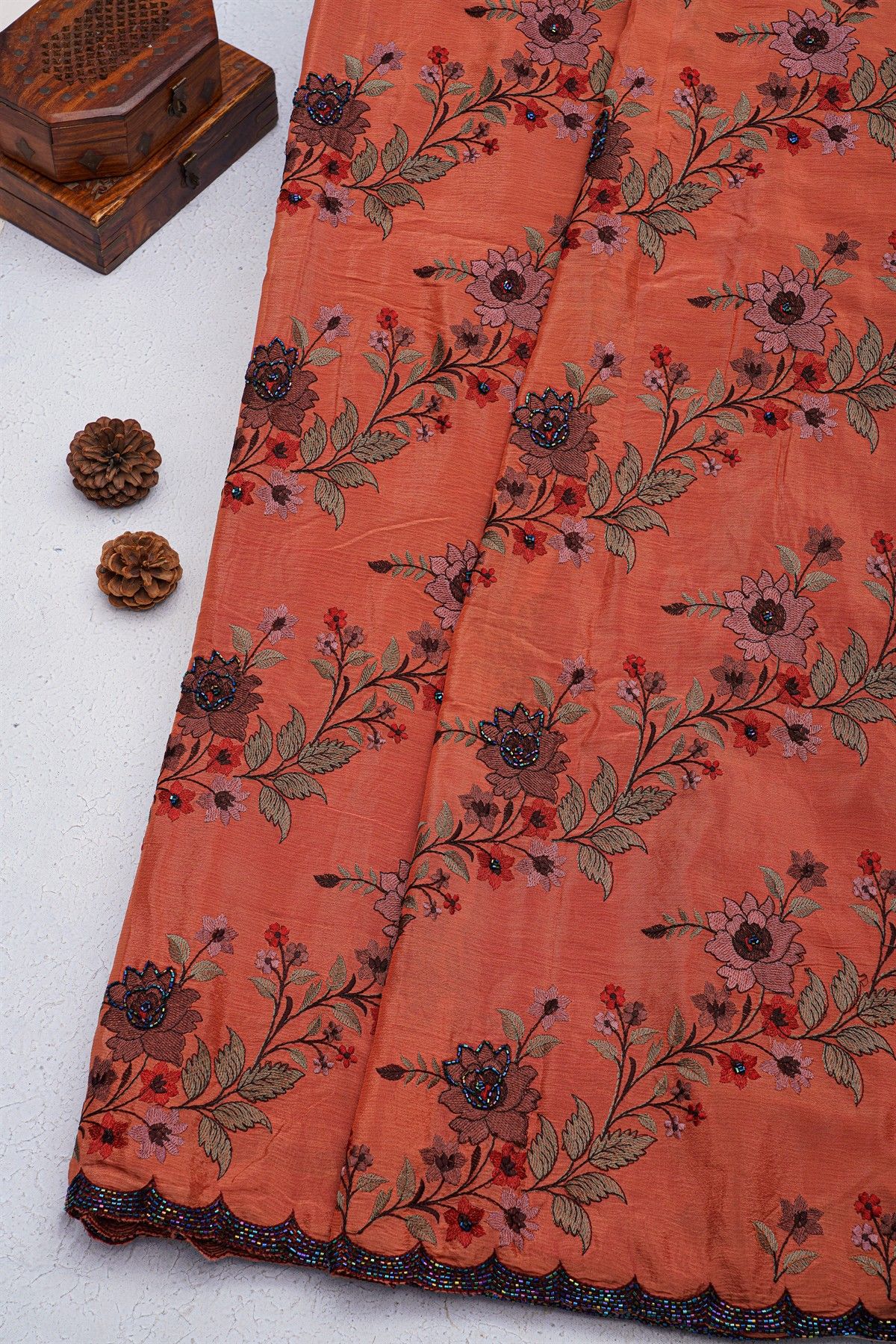 Fancy Georgette Peach Saree With Weaves Design In Kardana Work Border