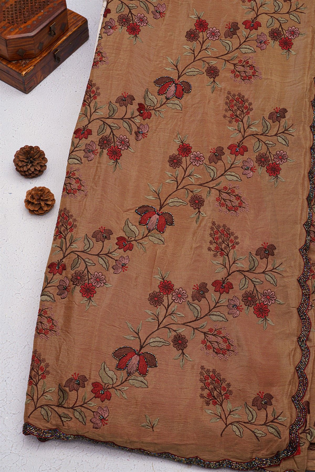 Designer Georgette Rust Saree With Weaves Design In Kardhana Work Border