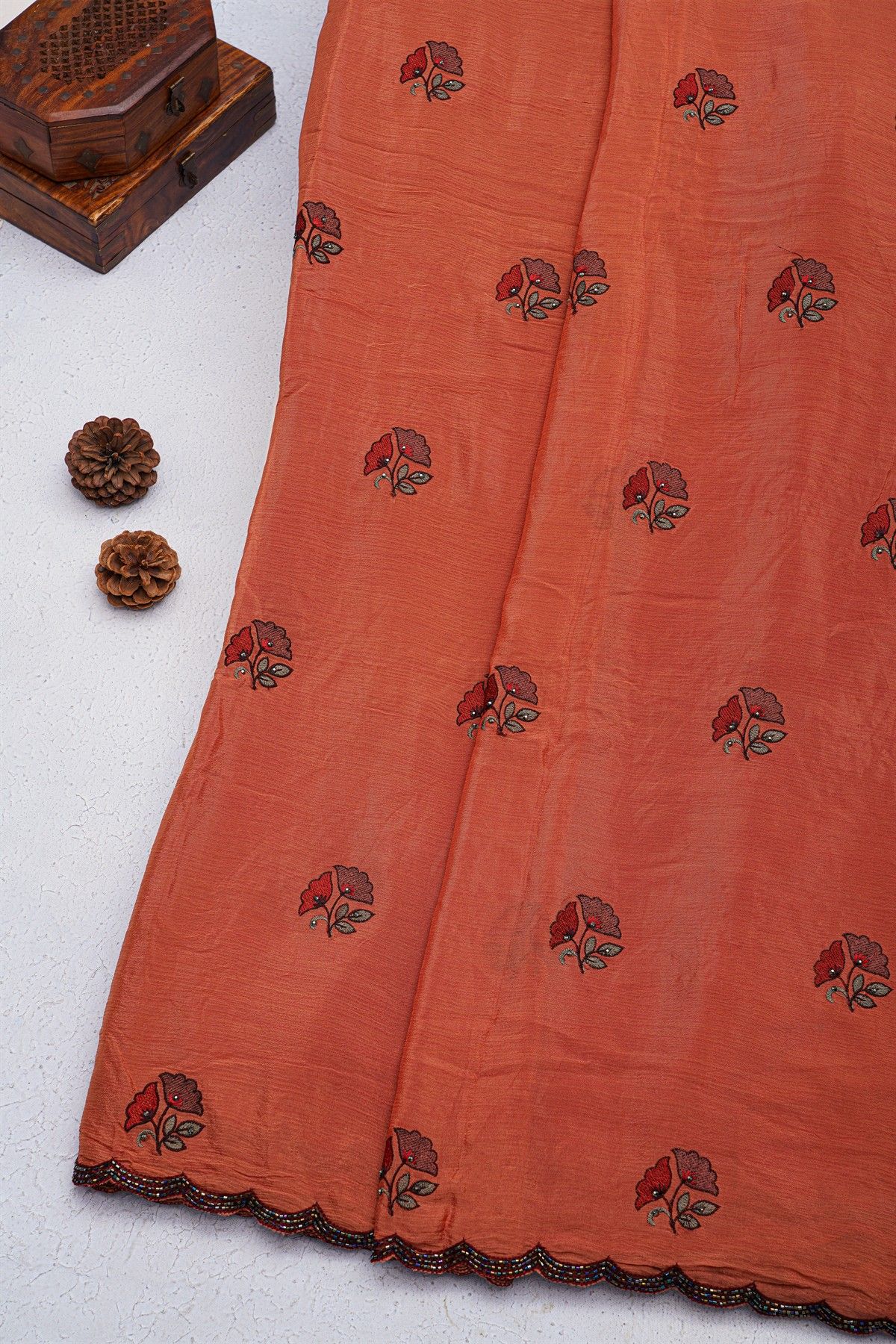 Designer Georgette Rust Saree With All Over Flower Design
