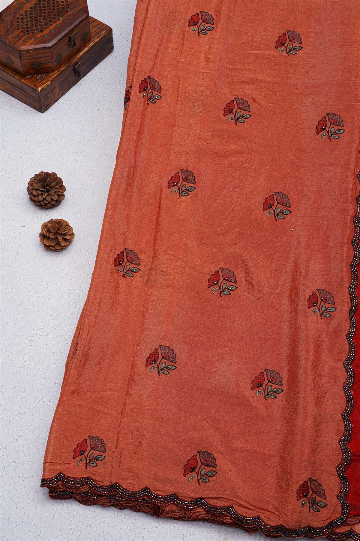 Designer Georgette Rust Saree With All Over Flower Design