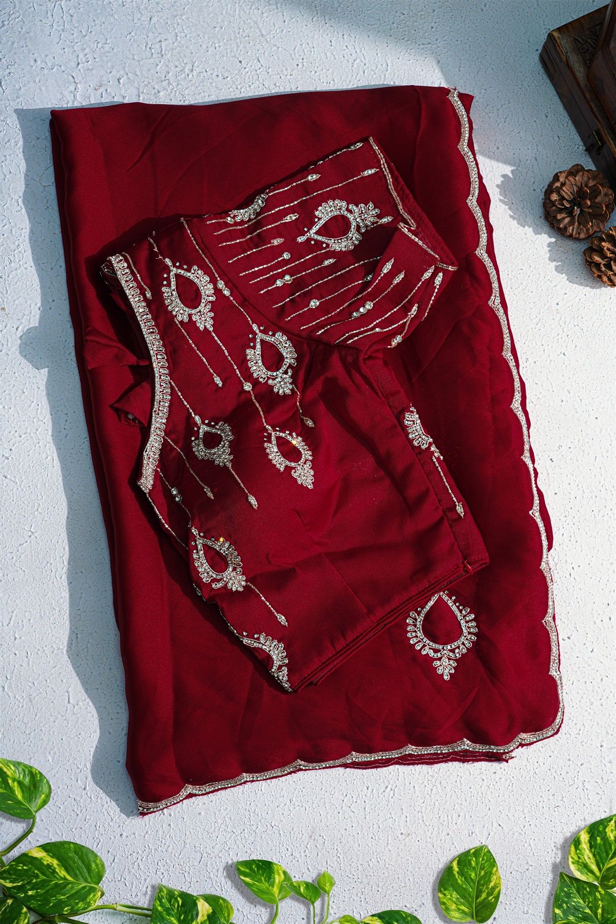 Designer Crepe Maroon Saree With Weaves Design In Kardhana Work Border