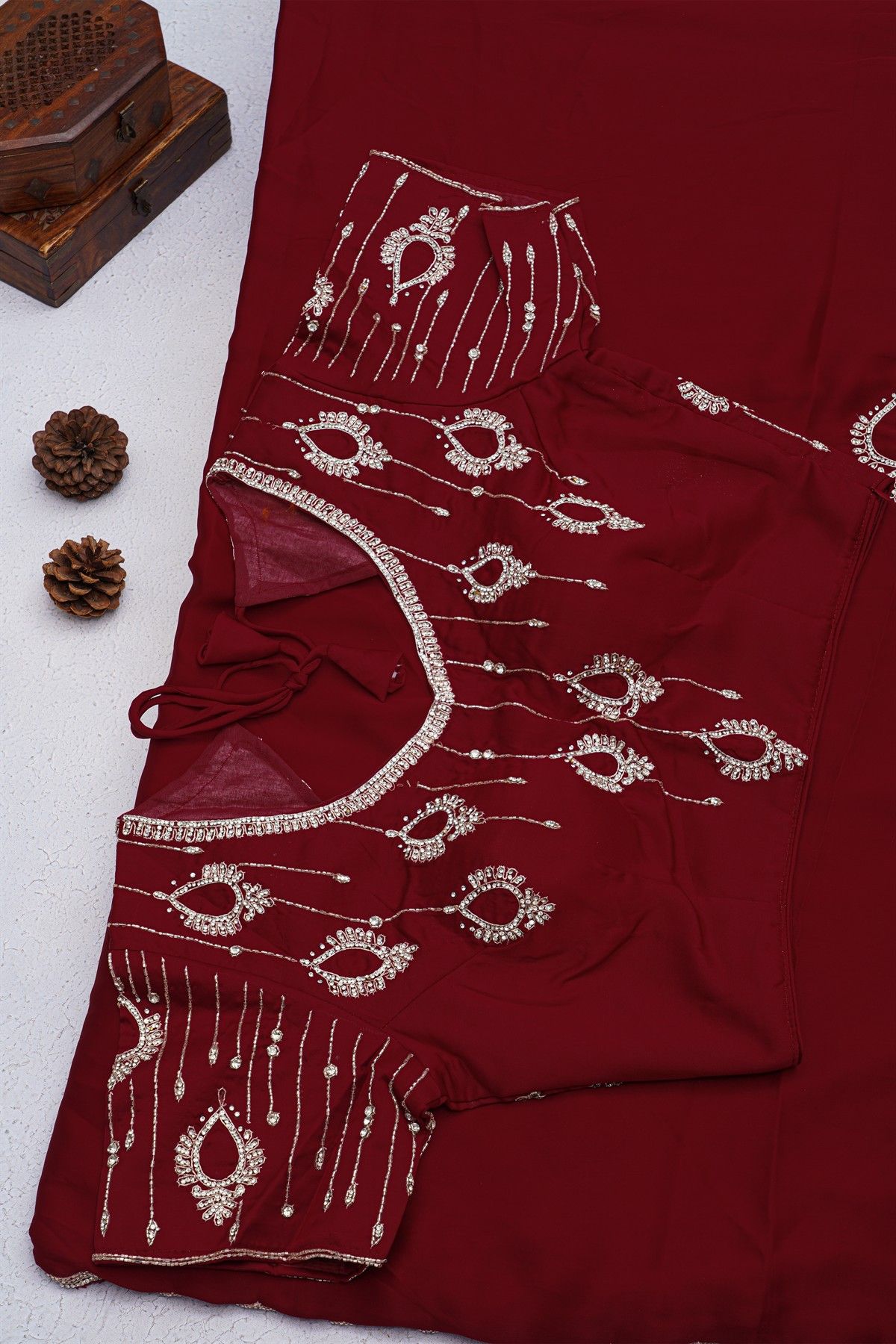 Designer Crepe Maroon Saree With Weaves Design In Kardhana Work Border