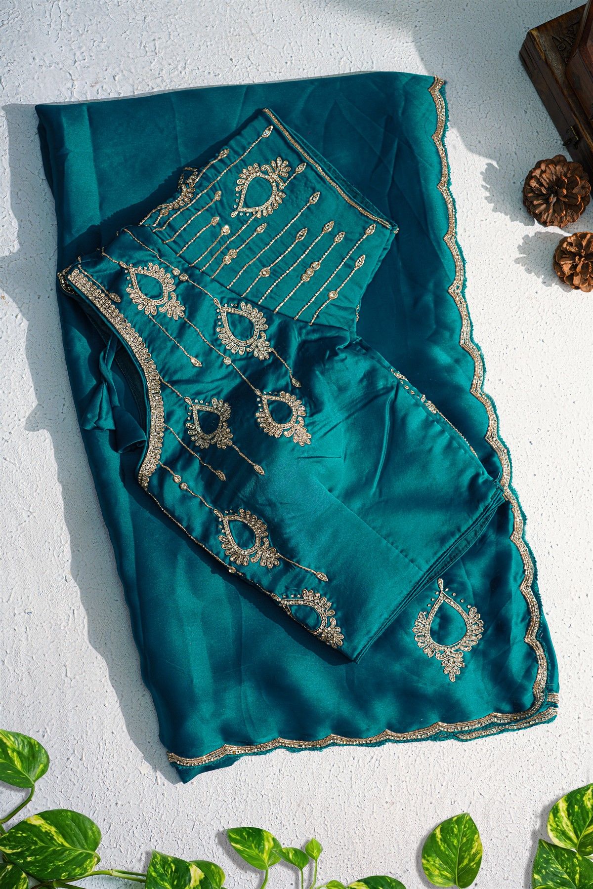 Designer Crepe Peacock Blue Saree With Waves Design In Kardhana Work Border
