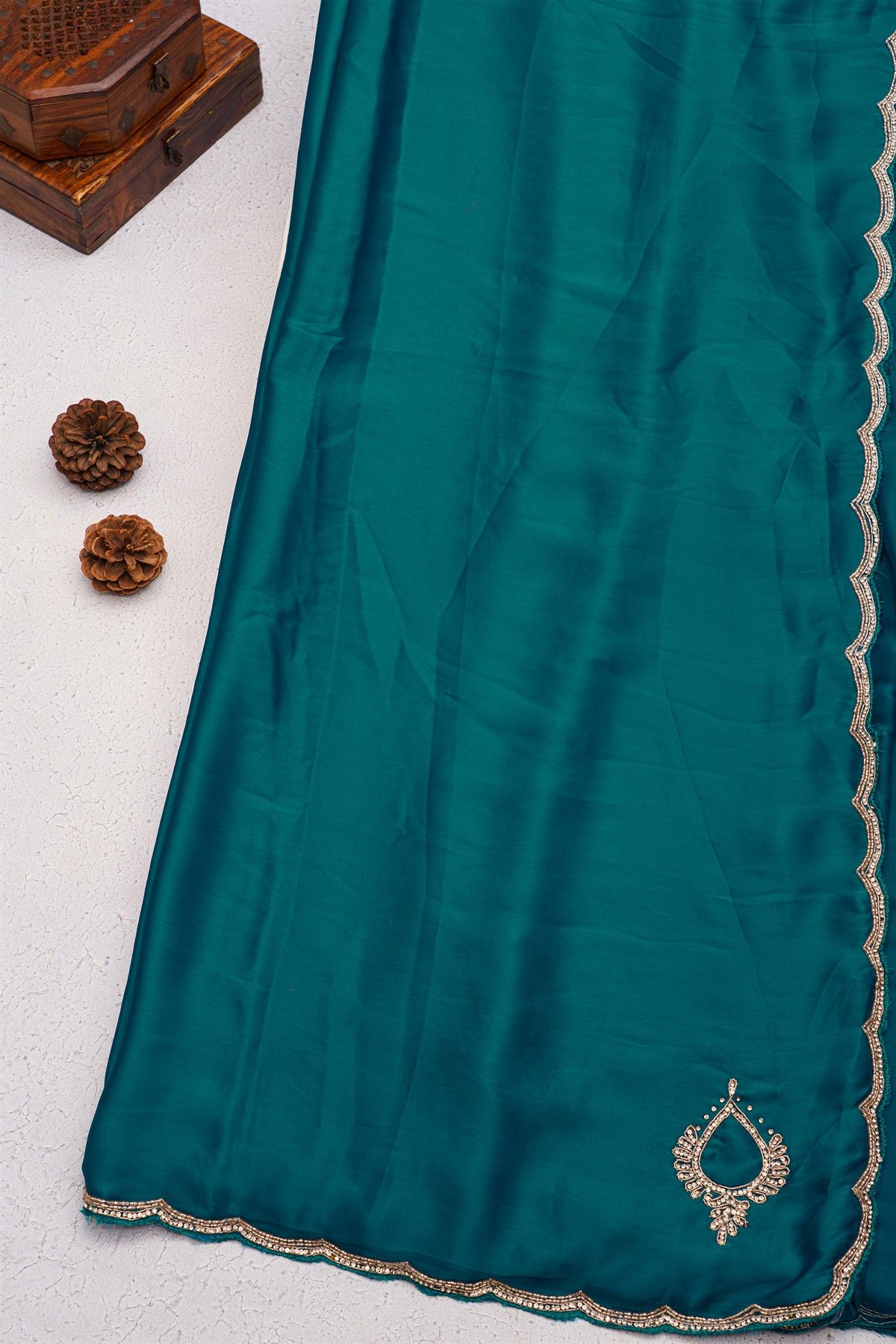 Designer Crepe Peacock Blue Saree With Waves Design In Kardhana Work Border