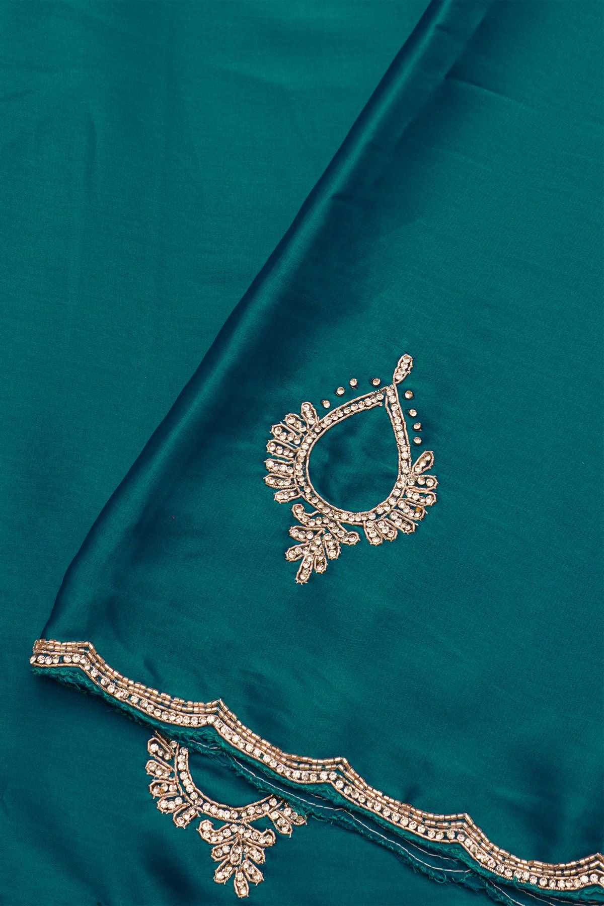 Designer Crepe Peacock Blue Saree With Waves Design In Kardhana Work Border
