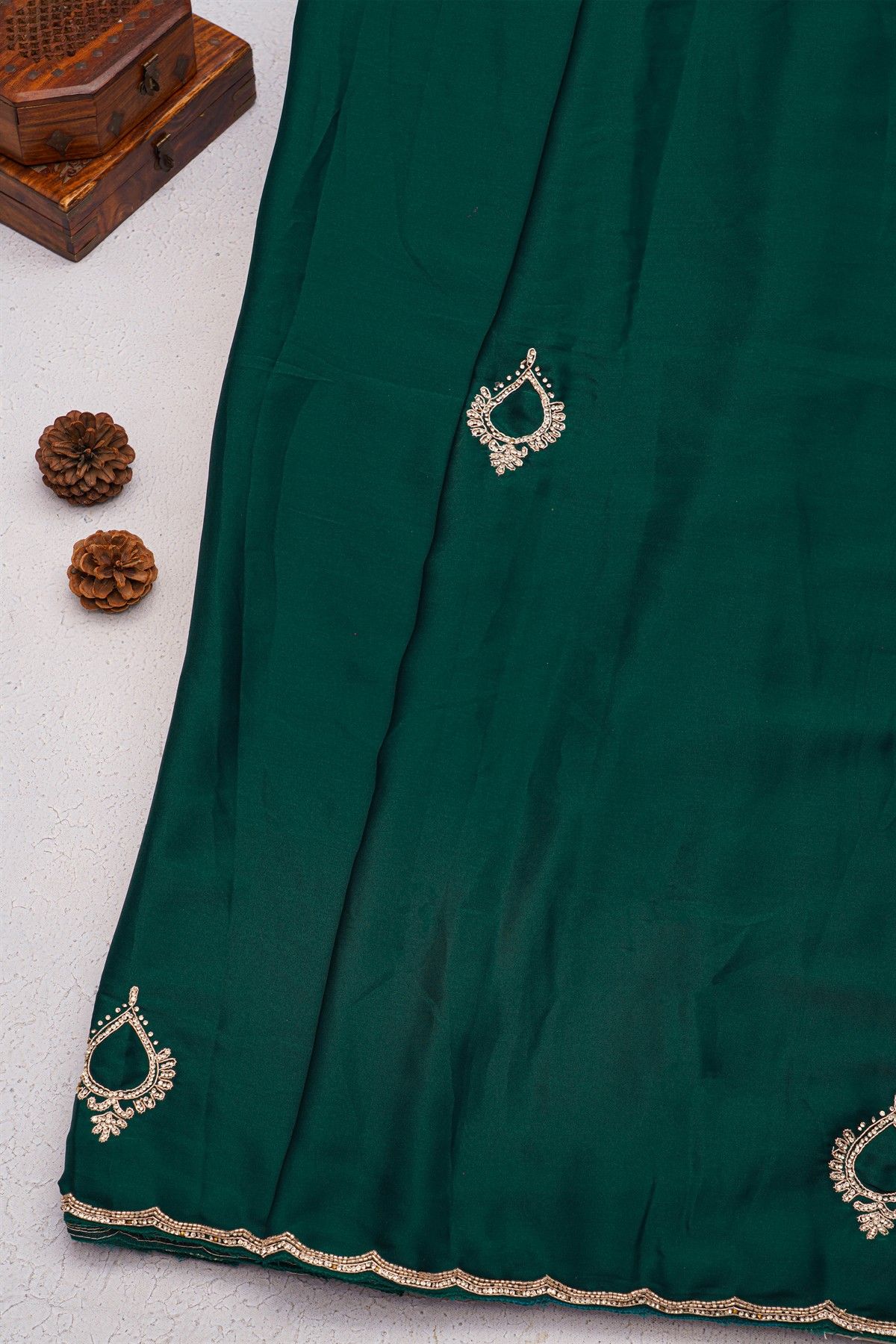 Designer Crepe Emerald Green Saree With Weaves Design In Kardhana Work Border