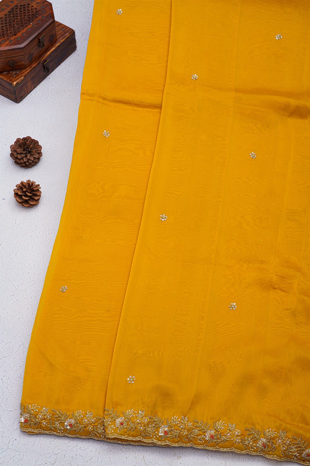 Designer Georgette Mustard Saree With Florals With Pearls And Kardhana Work Border