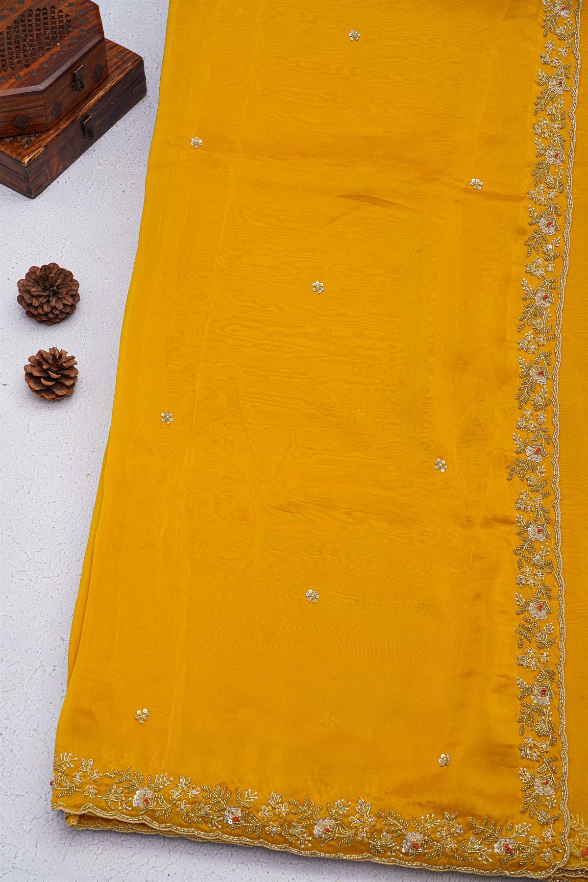 Designer Georgette Mustard Saree With Florals With Pearls And Kardhana Work Border
