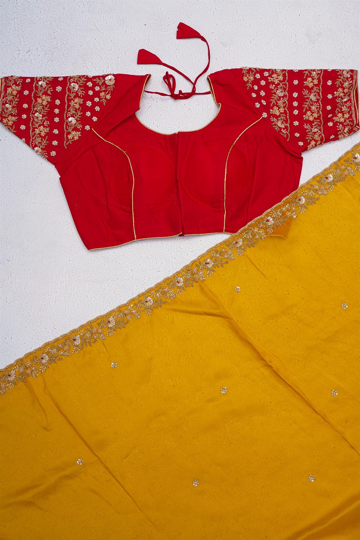 Designer Georgette Mustard Saree With Florals With Pearls And Kardhana Work Border