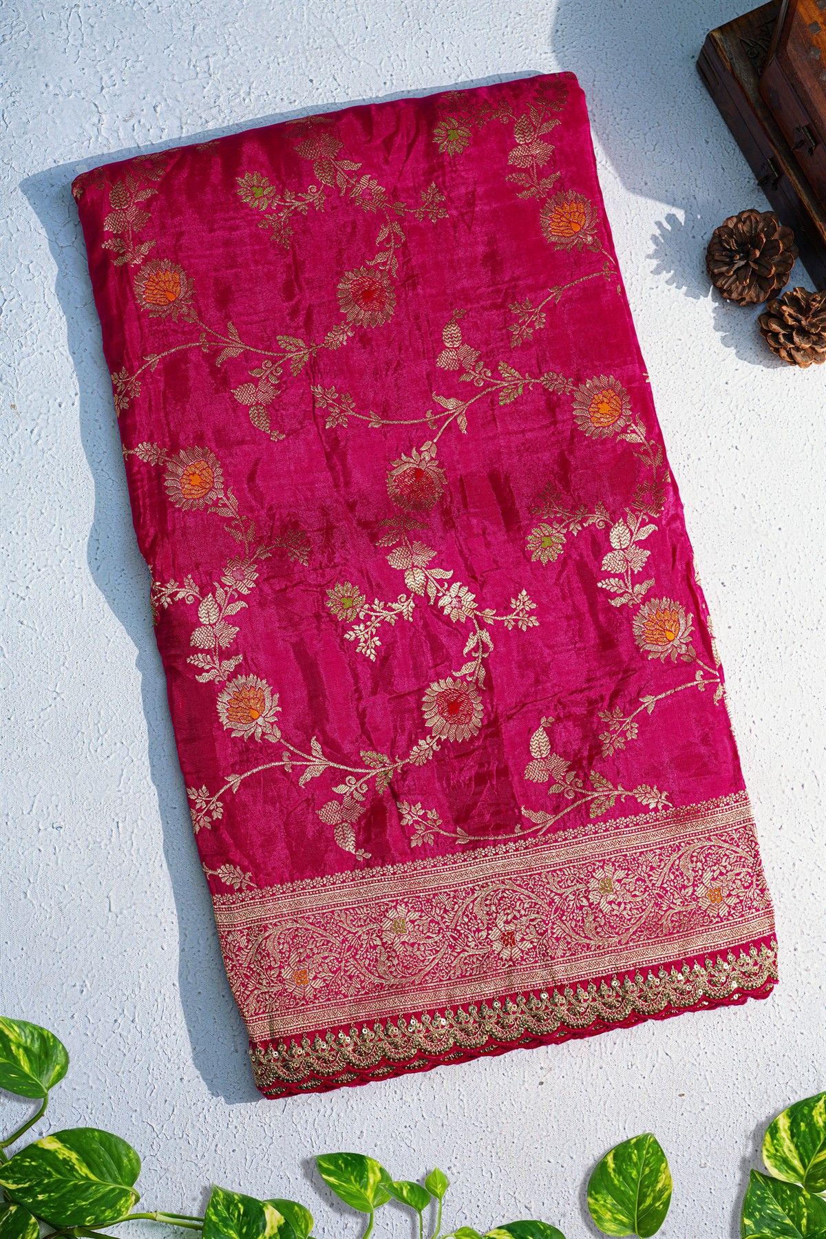 Designer Georgette Magenta Saree With Florals And Leaves With Zig-Zag Lines Border