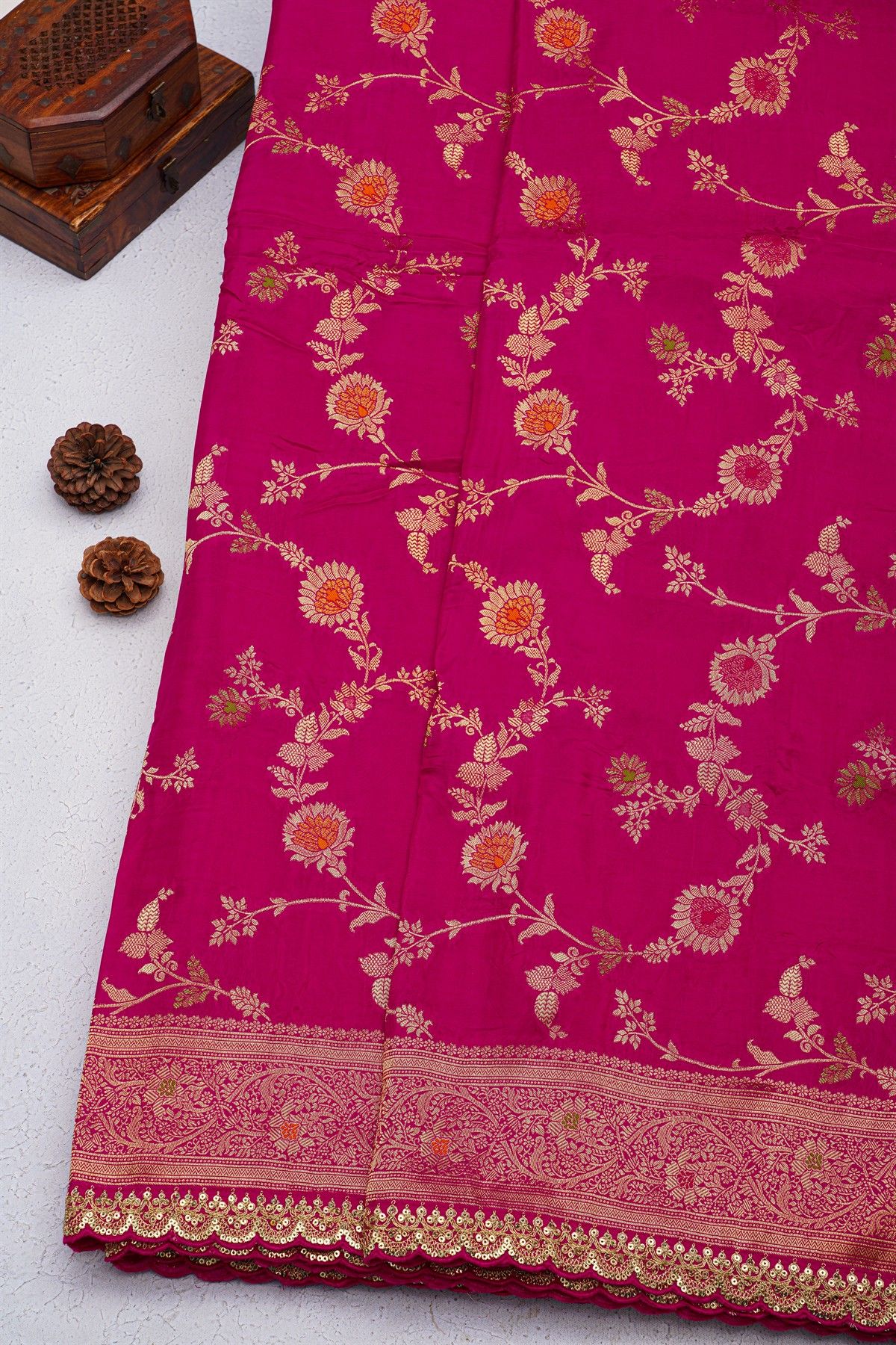 Designer Georgette Magenta Saree With Florals And Leaves With Zig-Zag Lines Border