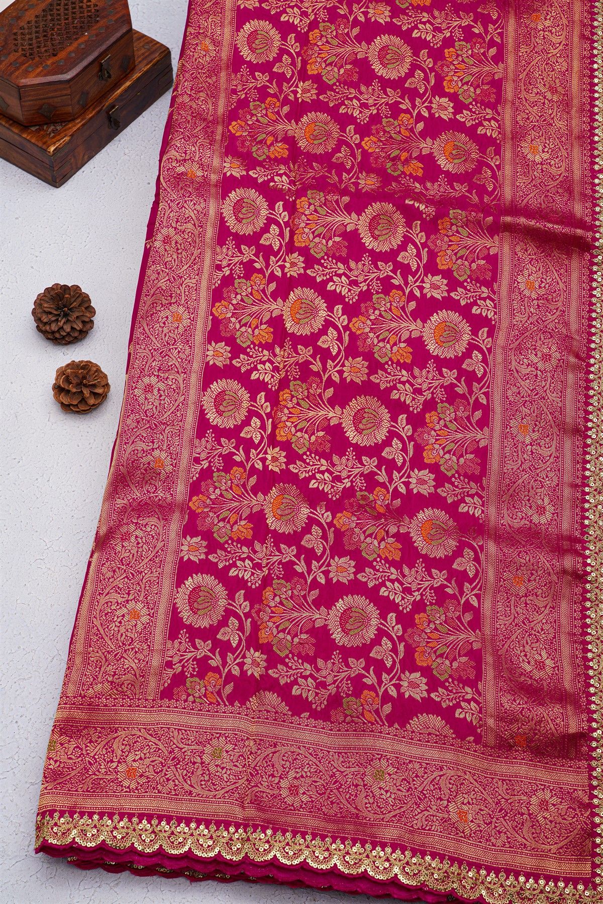 Designer Georgette Magenta Saree With Florals And Leaves With Zig-Zag Lines Border