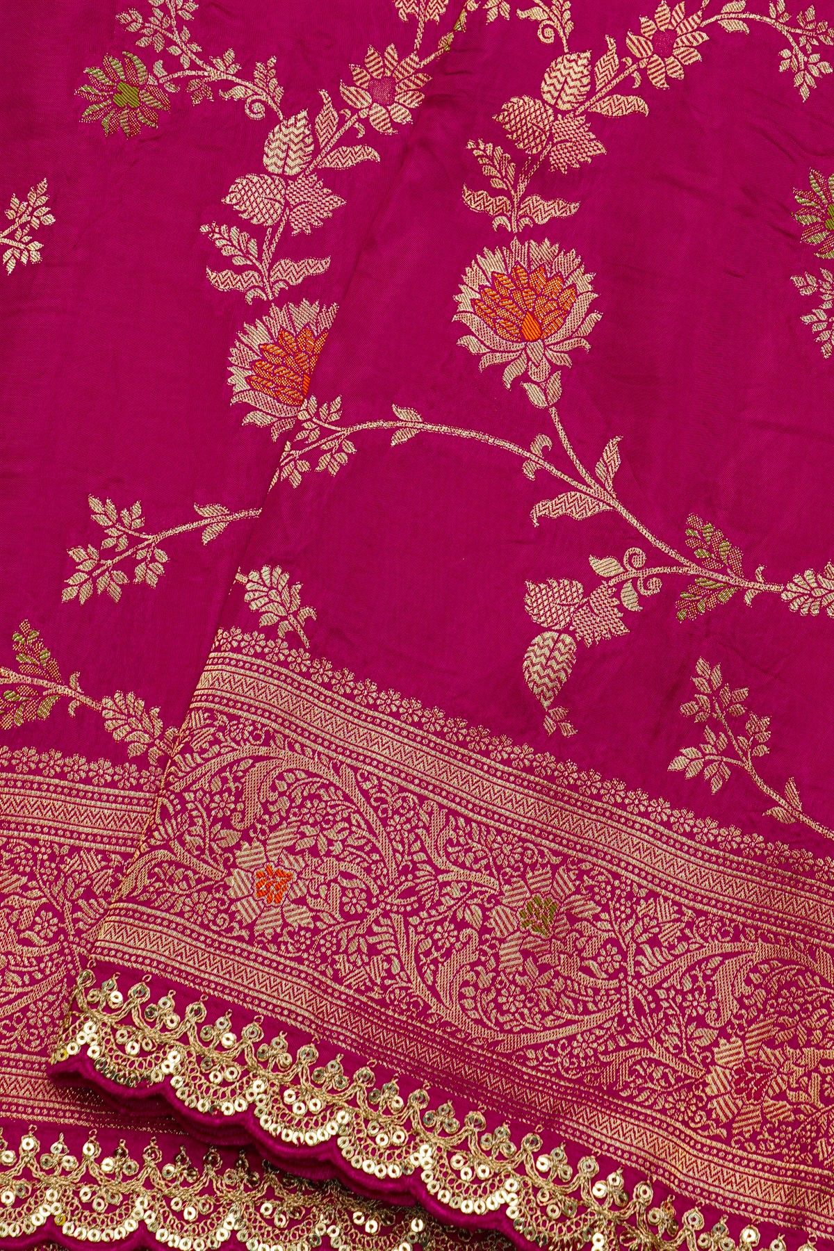 Designer Georgette Magenta Saree With Florals And Leaves With Zig-Zag Lines Border