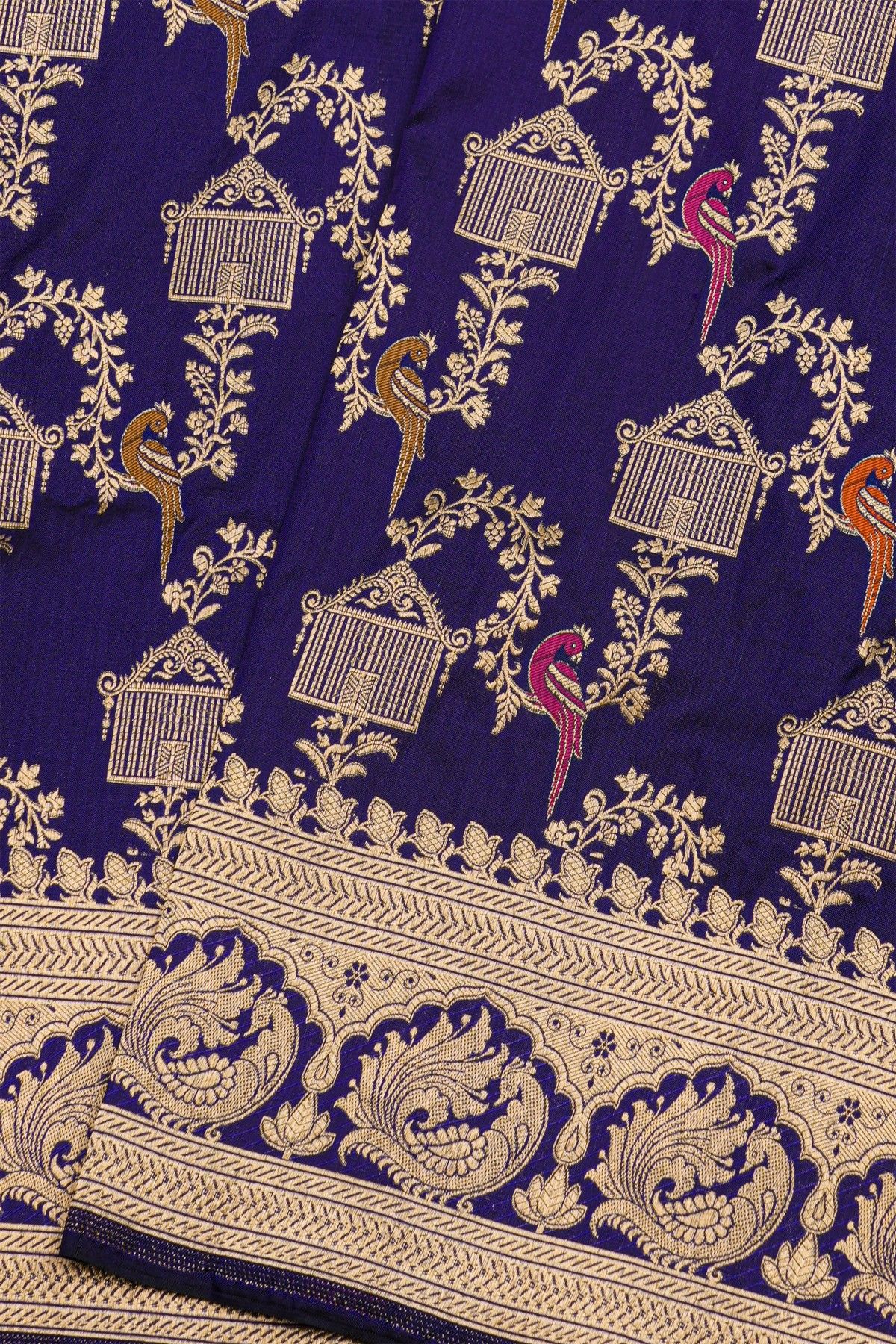Banarasi Silk Navy Blue Saree With Florals And Leaves With Peacocks In Zari Border