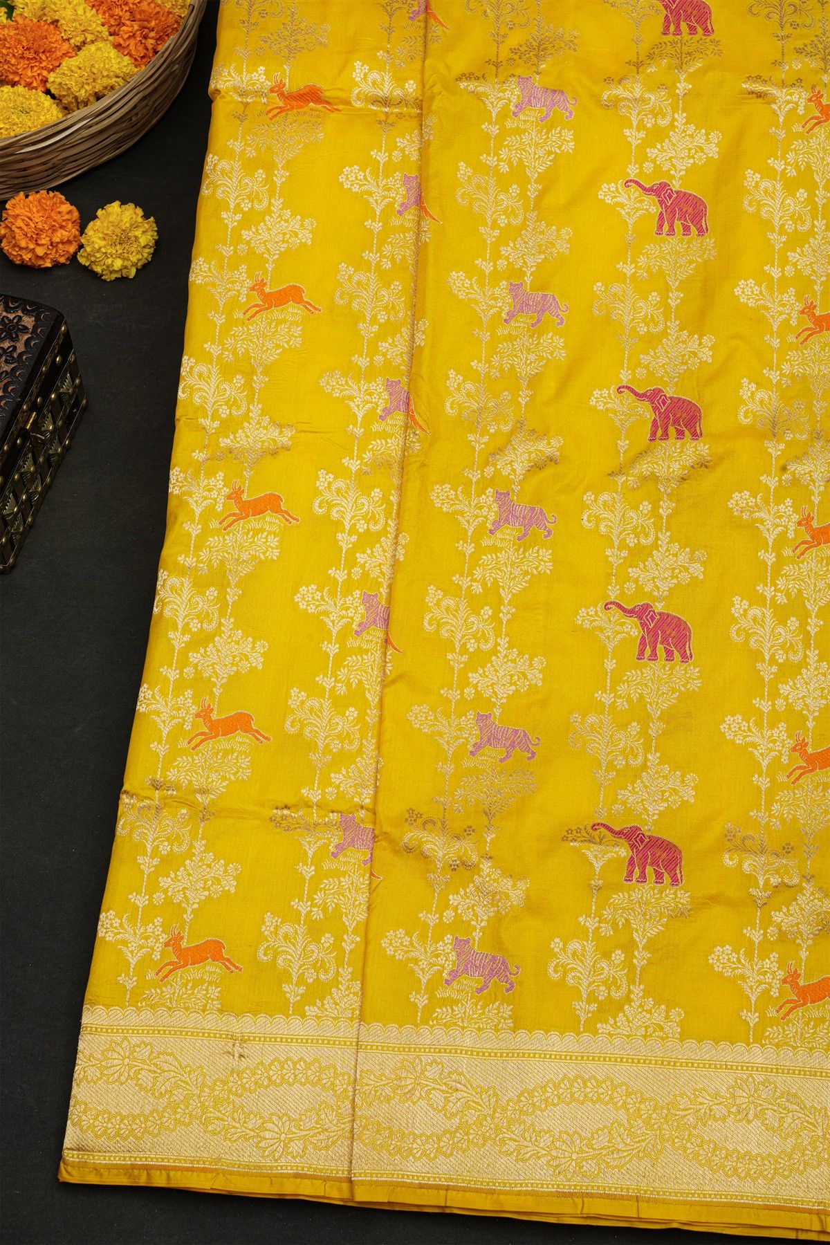 Banarasi Silk Yellow Saree With Florals And Leaves With Cross Lines Border