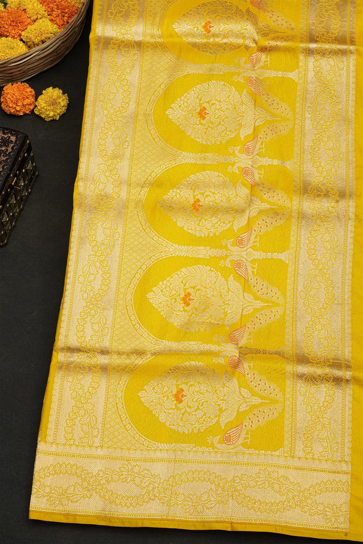 Banarasi Silk Yellow Saree With Florals And Leaves With Cross Lines Border