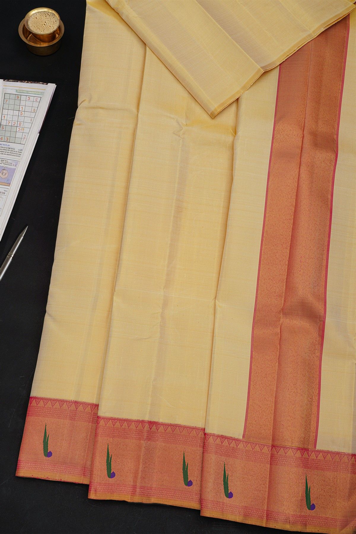 Kancheepuram Silk Cream Dhoti With Muniya Buttis Contrast Border