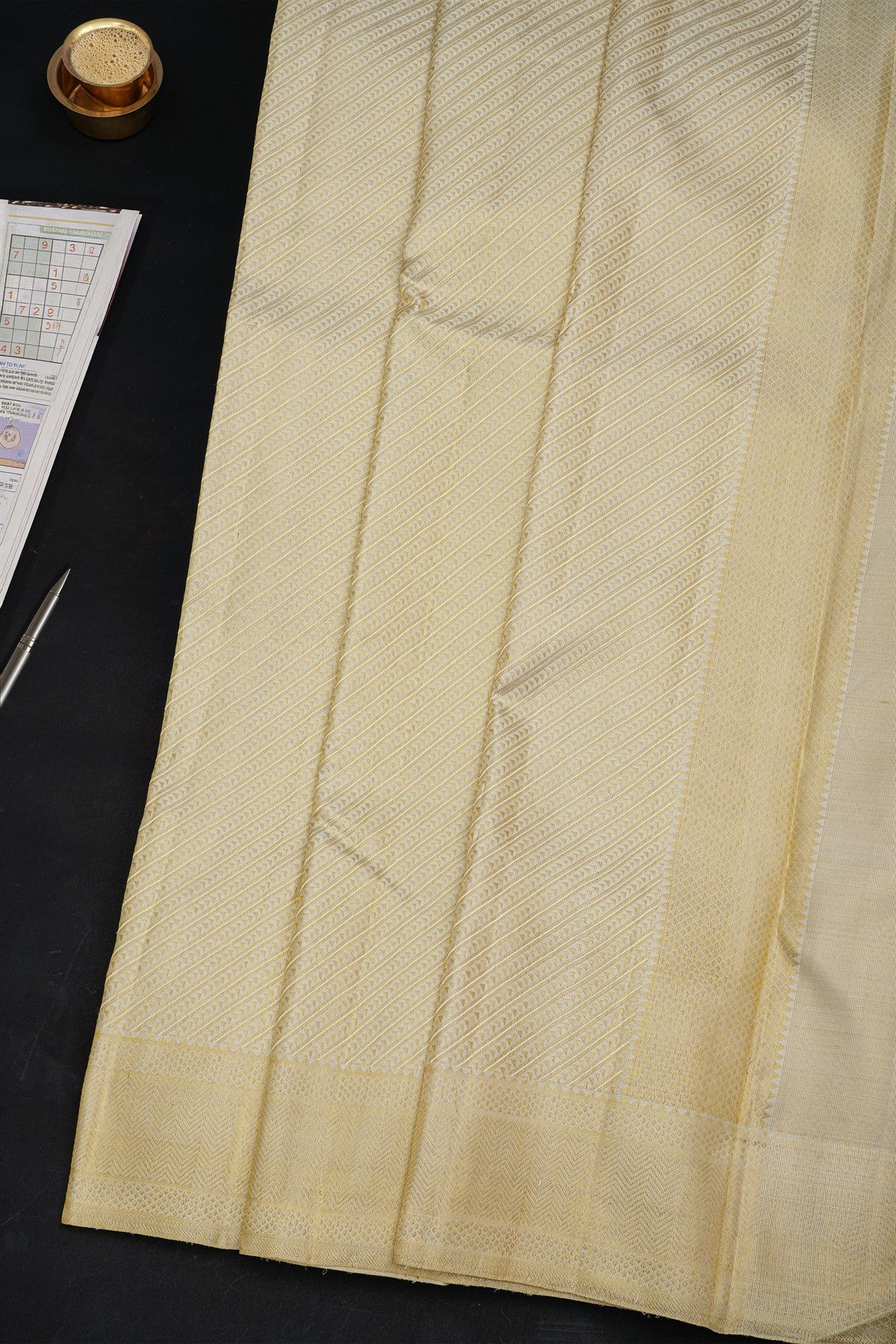 Kancheepuram Silk Off White Dhoti With Zig-Zag Lines Border