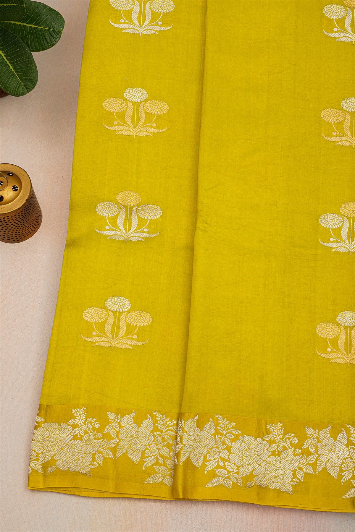 Fancy Matka Silk Mehendi Green Saree With Florals And Leaves Body And Self Florals And Leaves Border