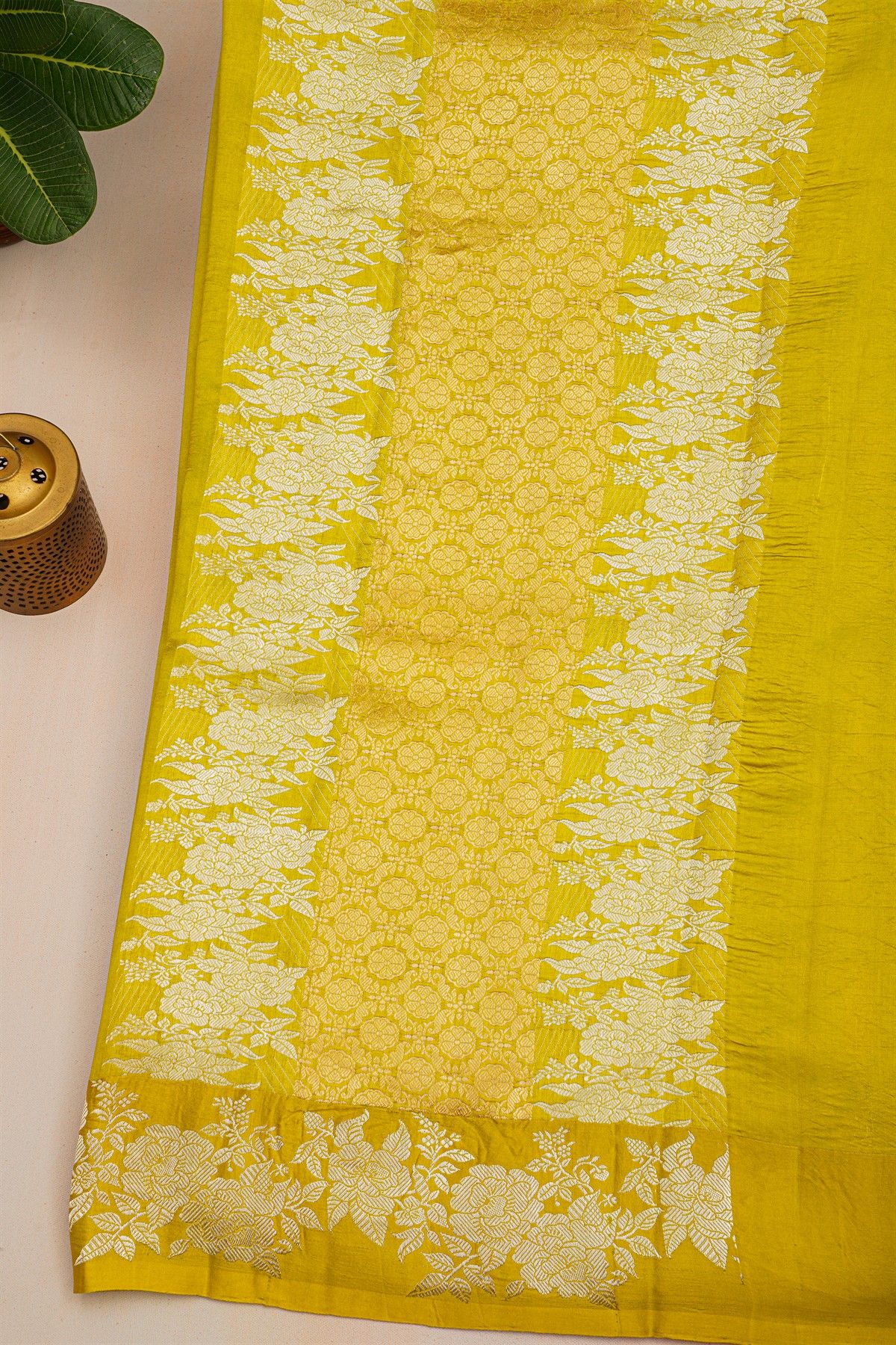 Fancy Matka Silk Mehendi Green Saree With Florals And Leaves Body And Self Florals And Leaves Border
