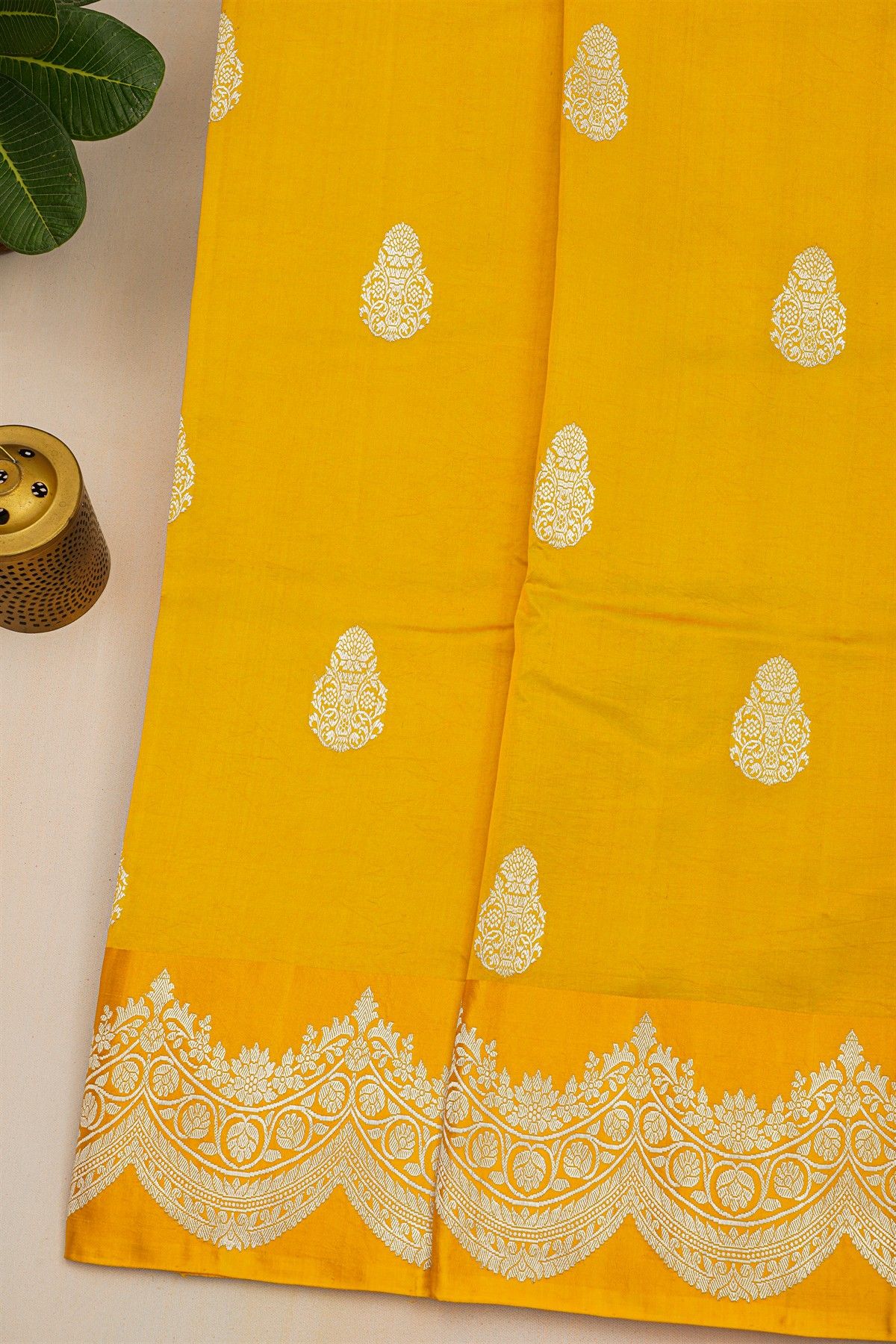 Fancy Matka Silk Golden Yellow Saree With Florals And Buttis Body And Self Florals And Leaves Jaal Border
