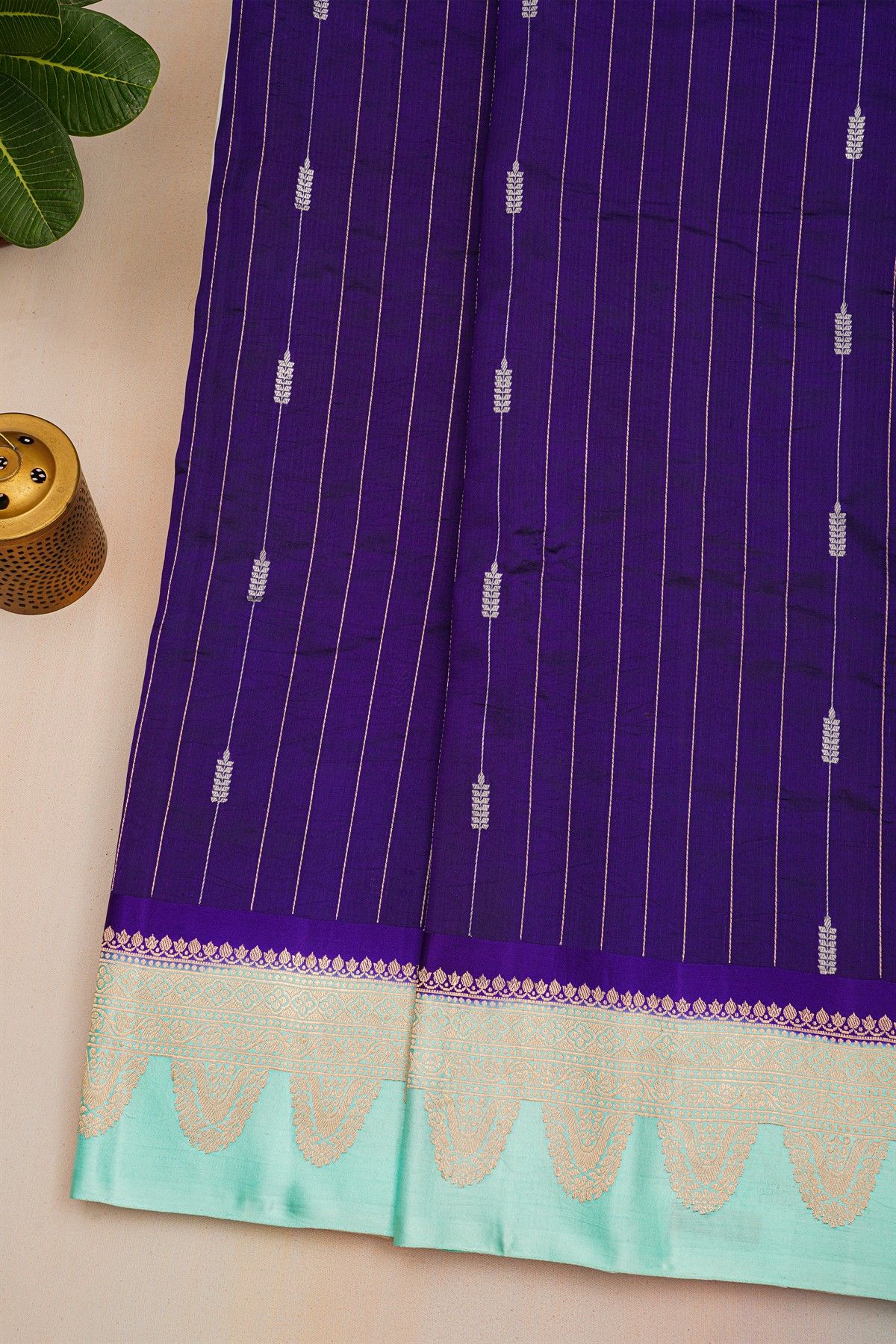 Fancy Matka Silk Purple Saree With Florals And Leaves With Zari Lines Body And Contrast Florals And Leaves Border