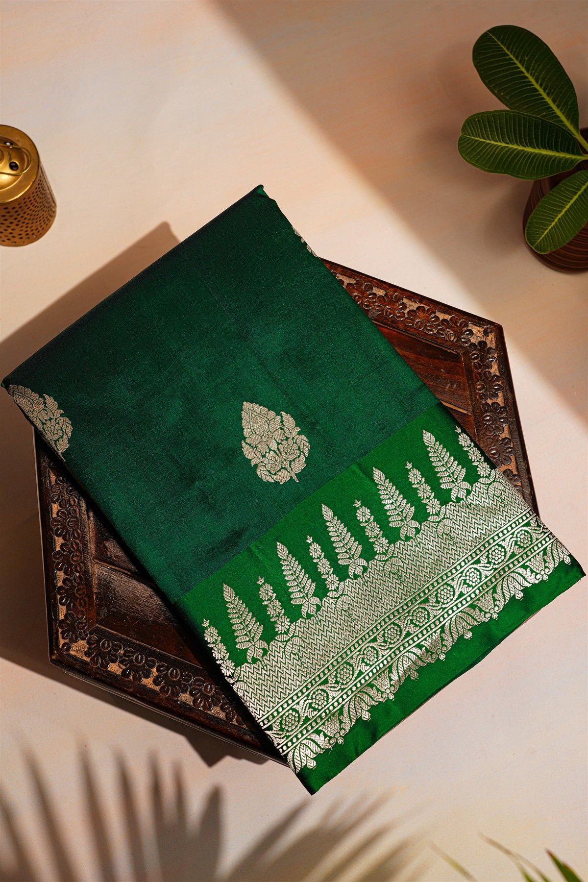 Fancy Matka Silk Bottle Green Saree With Florals And Buttis Body And Self Florals And Leaves Border