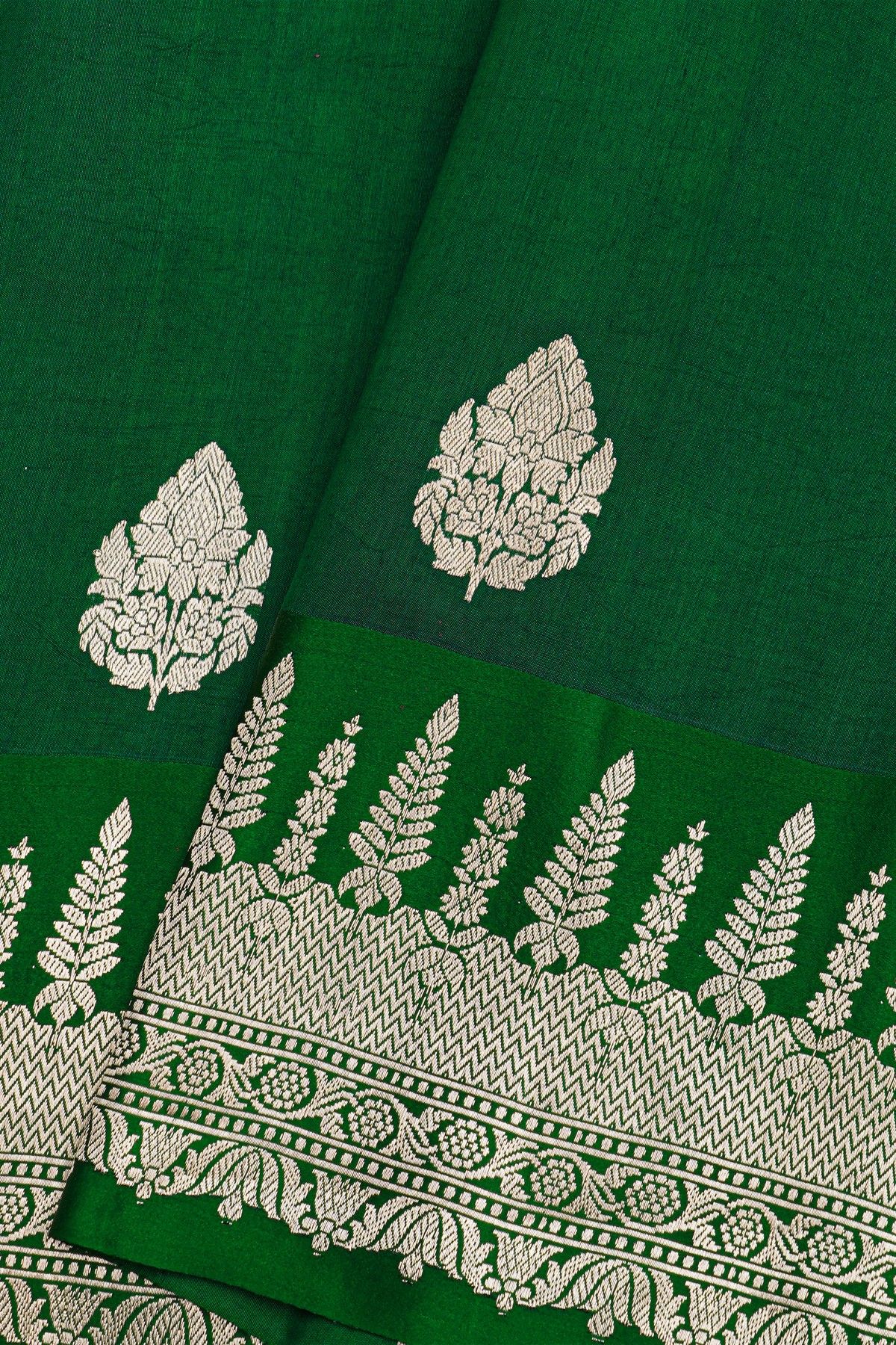 Fancy Matka Silk Bottle Green Saree With Florals And Buttis Body And Self Florals And Leaves Border