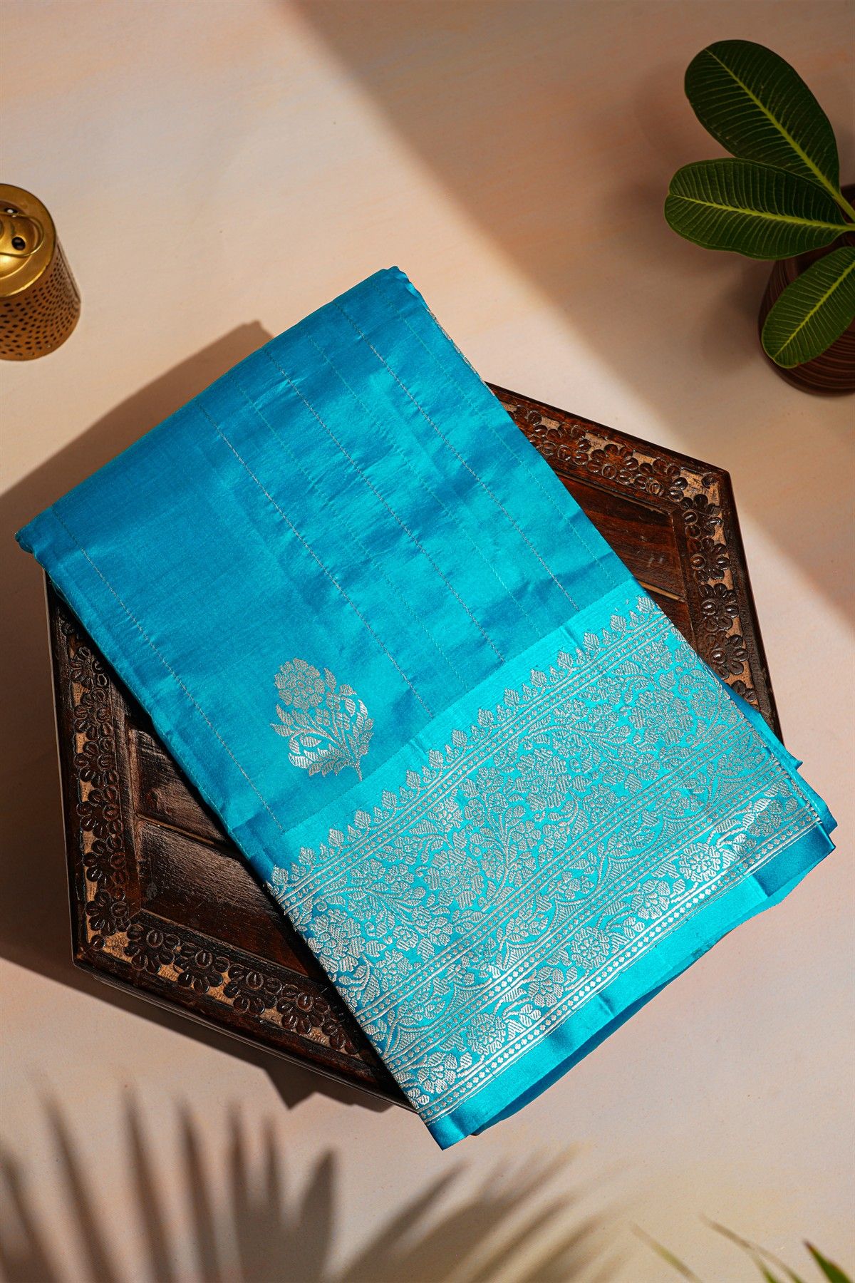 Fancy Matka Silk Rama Blue Saree With Buttis With Zari Lines Body And Self Florals And Leaves Jaal Border