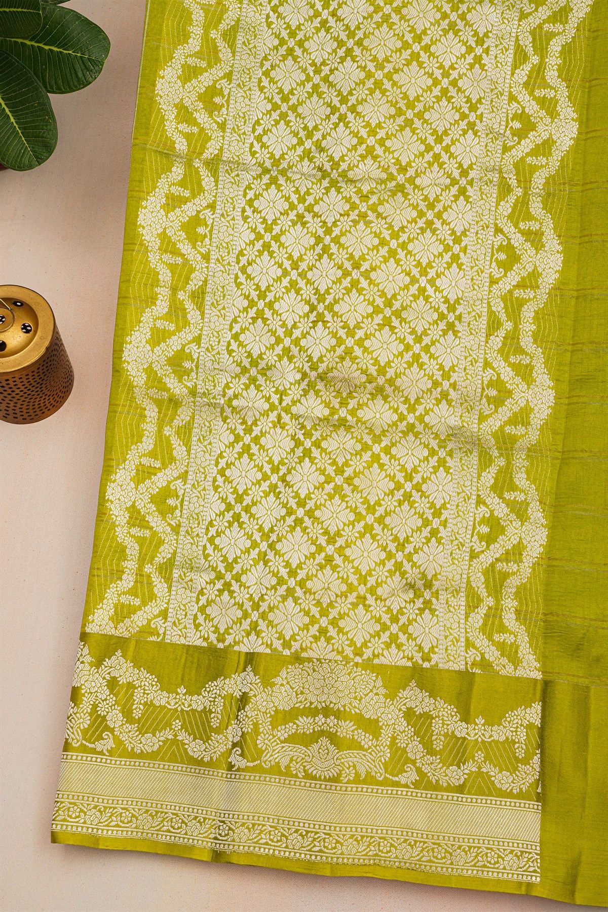 Fancy Matka Silk Mehendi Green Saree With Checks Body And Self Florals And Leaves Jaal Border