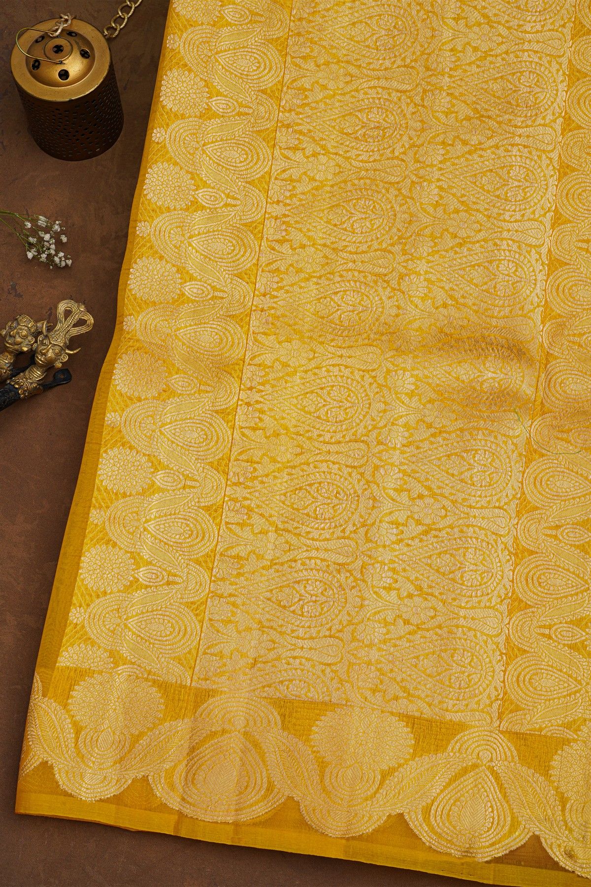 Fancy Organza Yellow Saree With Florals And Buttis Body And Self Florals And Leaves Border