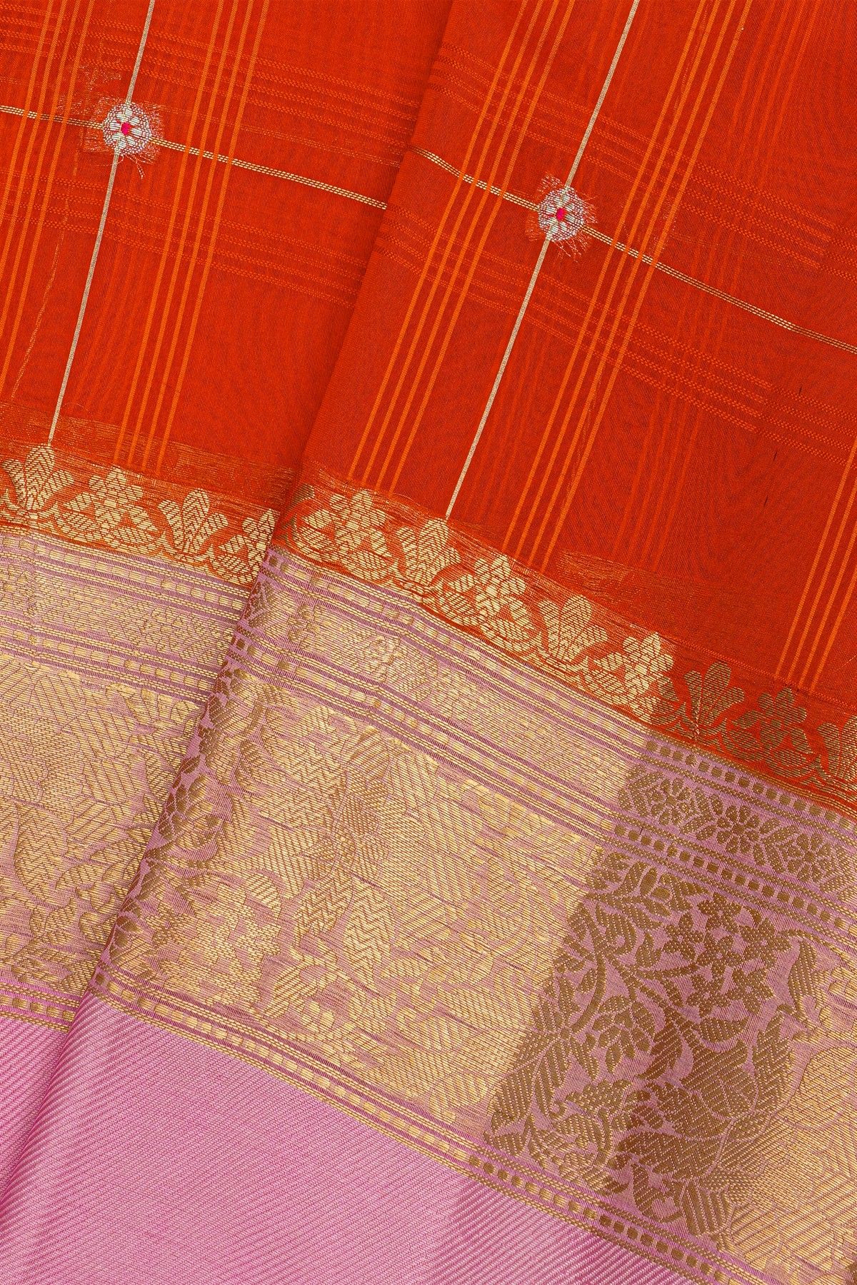 Fancy Organza Orange Saree With Checks And Buttis Body And Contrast Florals And Leaves Border