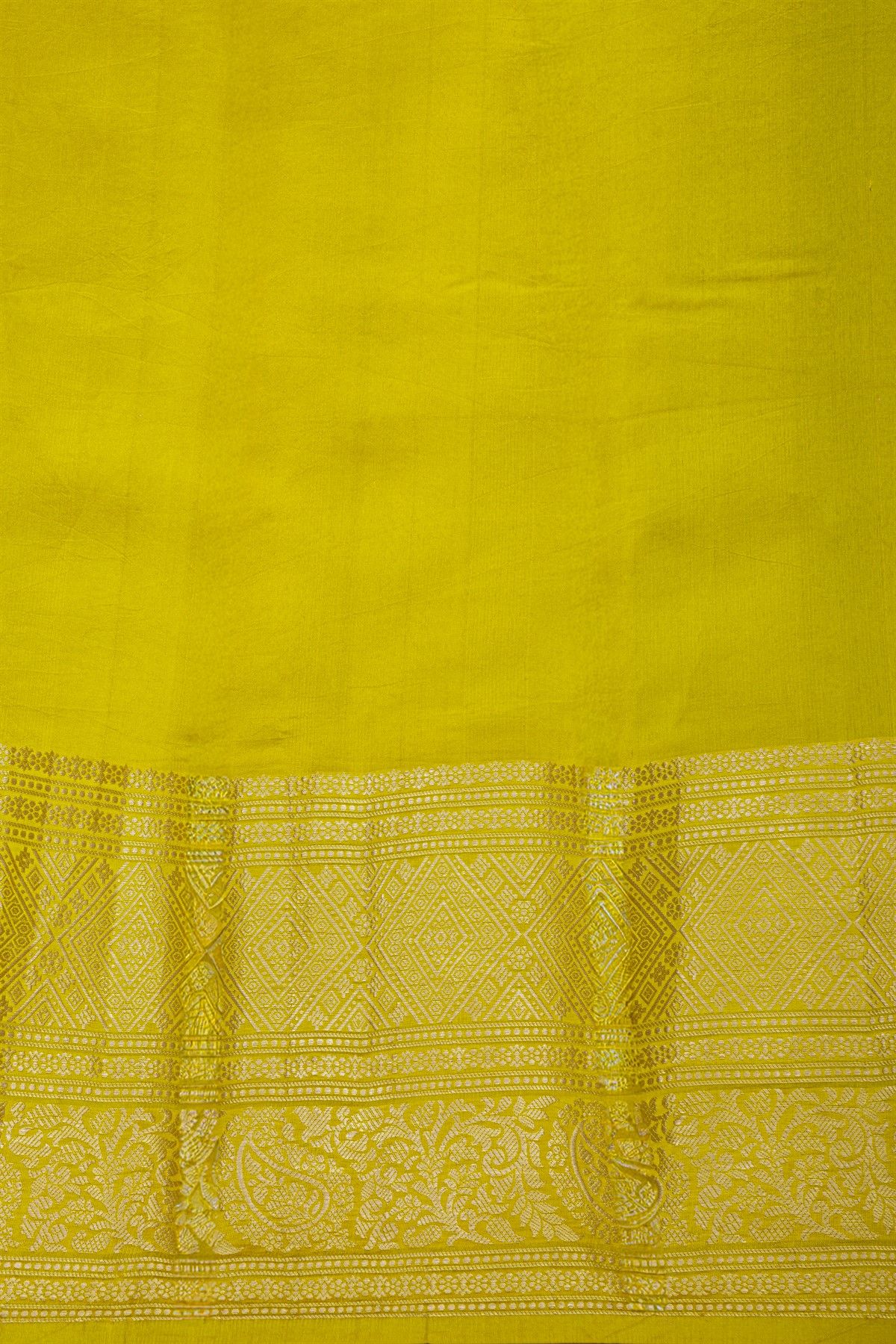 Fancy Kora Grey Saree With Checks And Floral Buttis Body