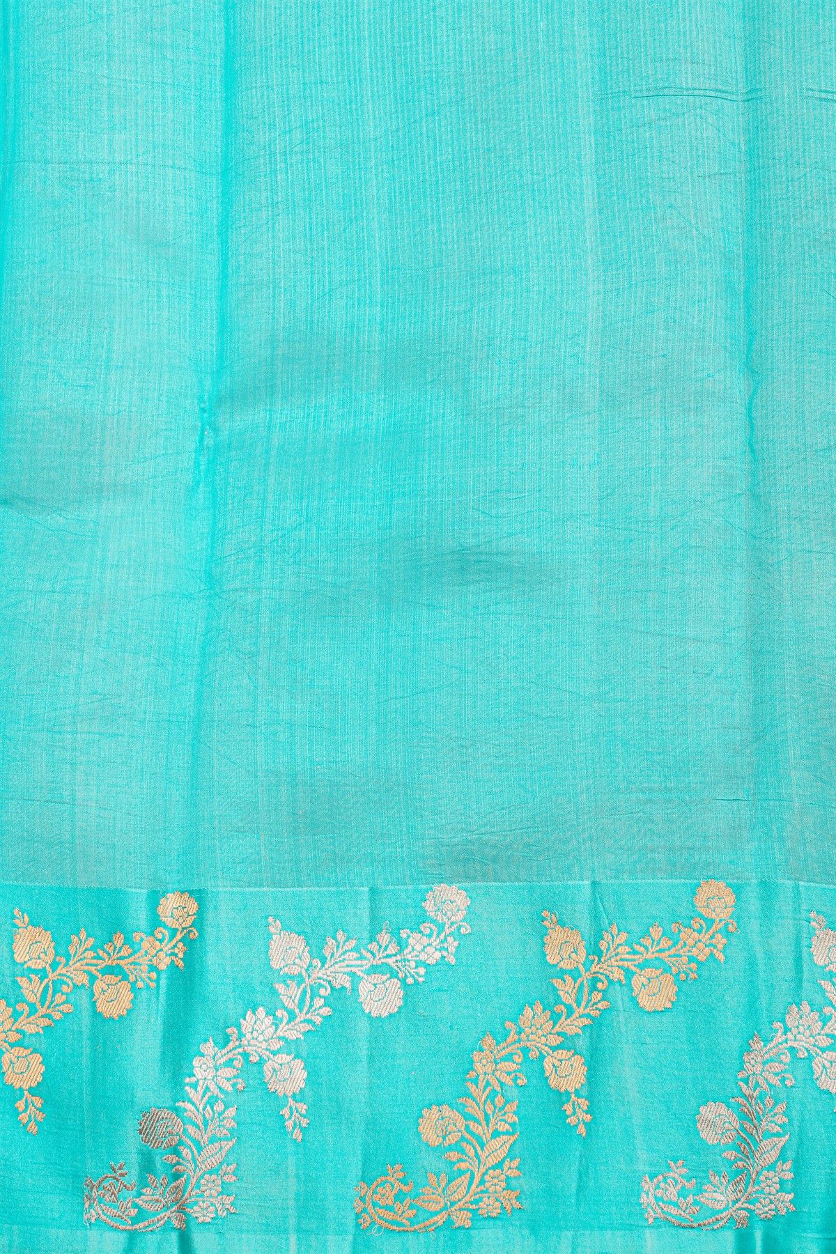 Fancy Matka Silk Peacock Blue Saree With Florals And Buttis Body And Contrast Florals And Leaves Border