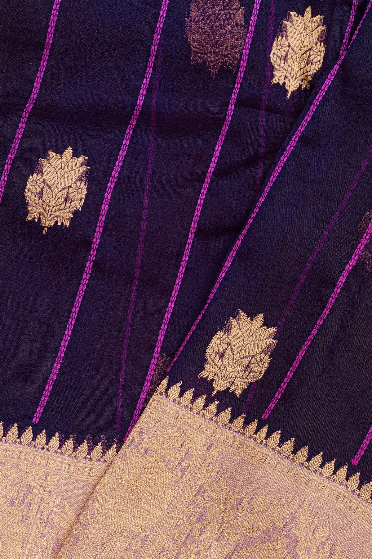 Fancy Organza Purple Saree With Zari Lines And Buttis Body And Contrast Florals And Leaves Border