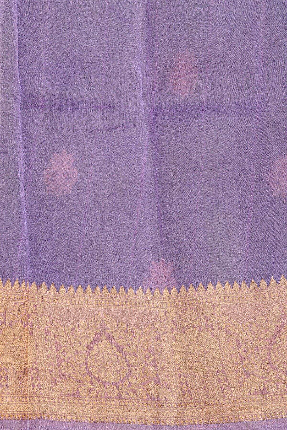 Fancy Organza Purple Saree With Zari Lines And Buttis Body And Contrast Florals And Leaves Border