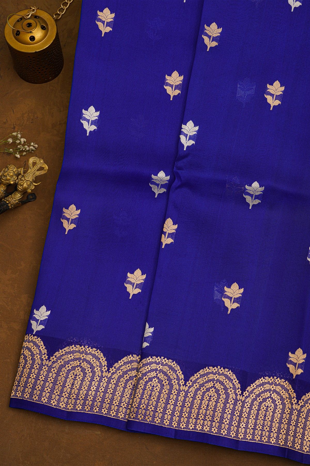 Fancy Organza Royal Blue Saree With Florals And Buttis Body And Self Florals And Leaves Border
