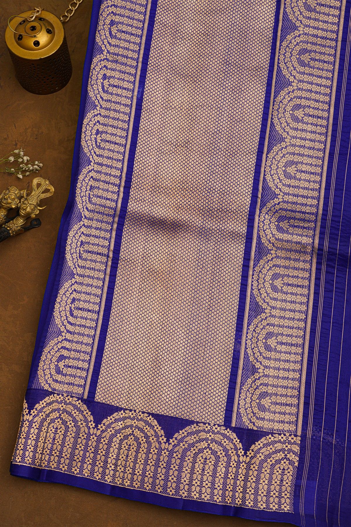 Fancy Organza Royal Blue Saree With Florals And Buttis Body And Self Florals And Leaves Border