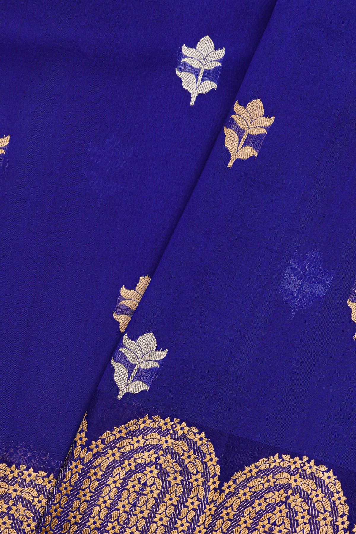 Fancy Organza Royal Blue Saree With Florals And Buttis Body And Self Florals And Leaves Border