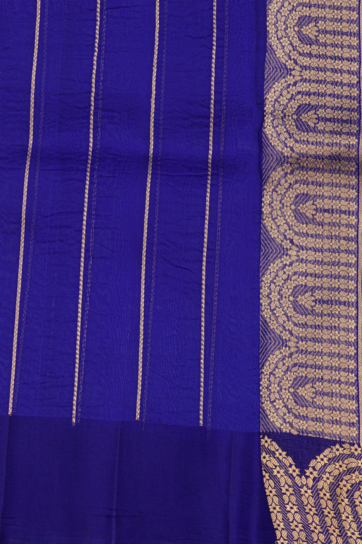 Fancy Organza Royal Blue Saree With Florals And Buttis Body And Self Florals And Leaves Border