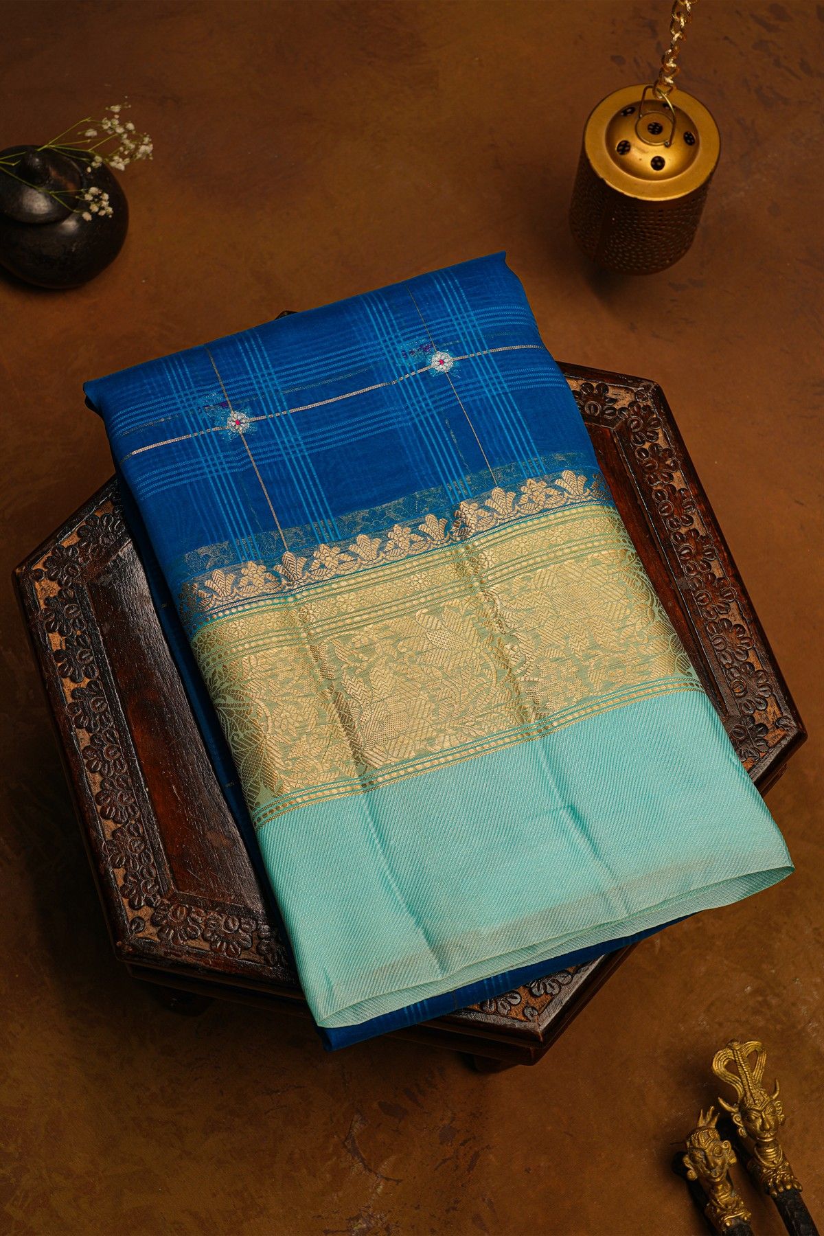 Fancy Organza Royal Blue Saree With Checks And Florals Body And Contrast Florals And Leaves Border