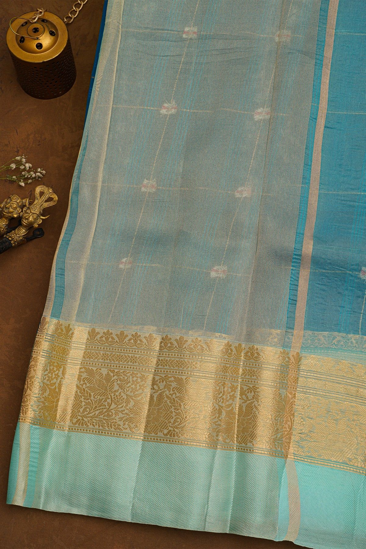 Fancy Organza Royal Blue Saree With Checks And Florals Body And Contrast Florals And Leaves Border