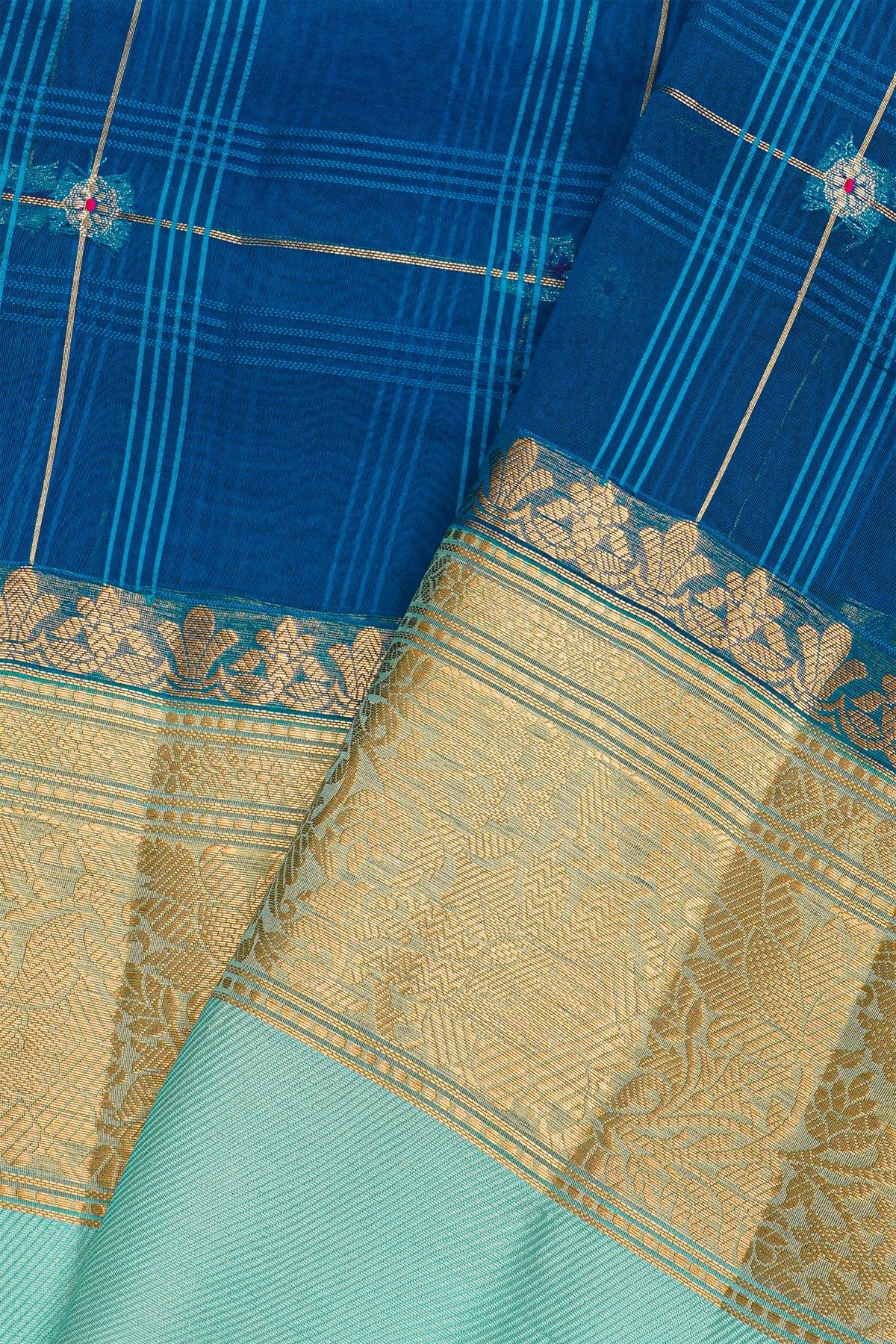 Fancy Organza Royal Blue Saree With Checks And Florals Body And Contrast Florals And Leaves Border