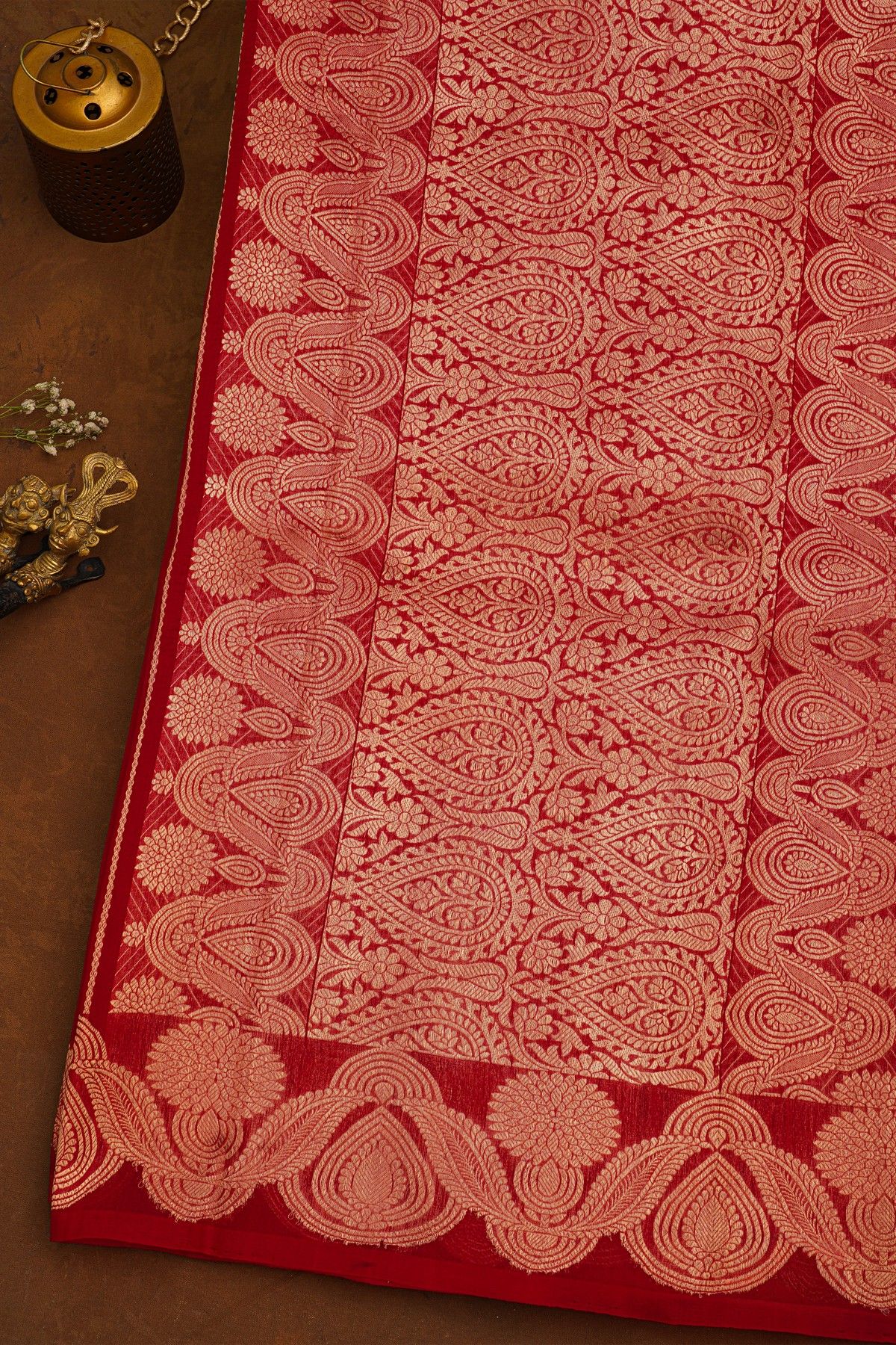 Fancy Organza Red Saree With Florals And Buttis Body And Self Florals And Leaves Border