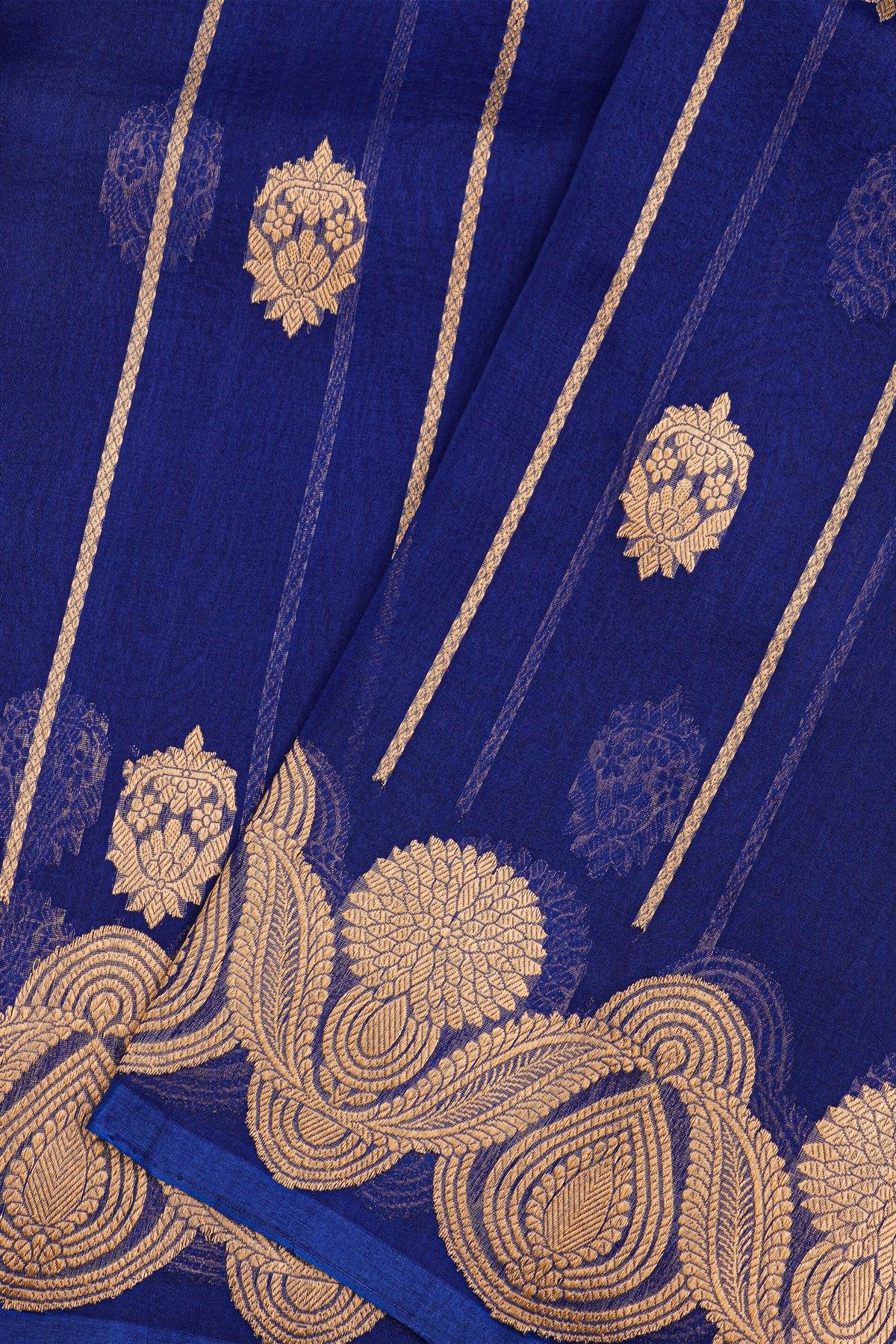 Fancy Organza Royal Blue Saree With Florals And Buttis Body And Self Florals And Leaves Border