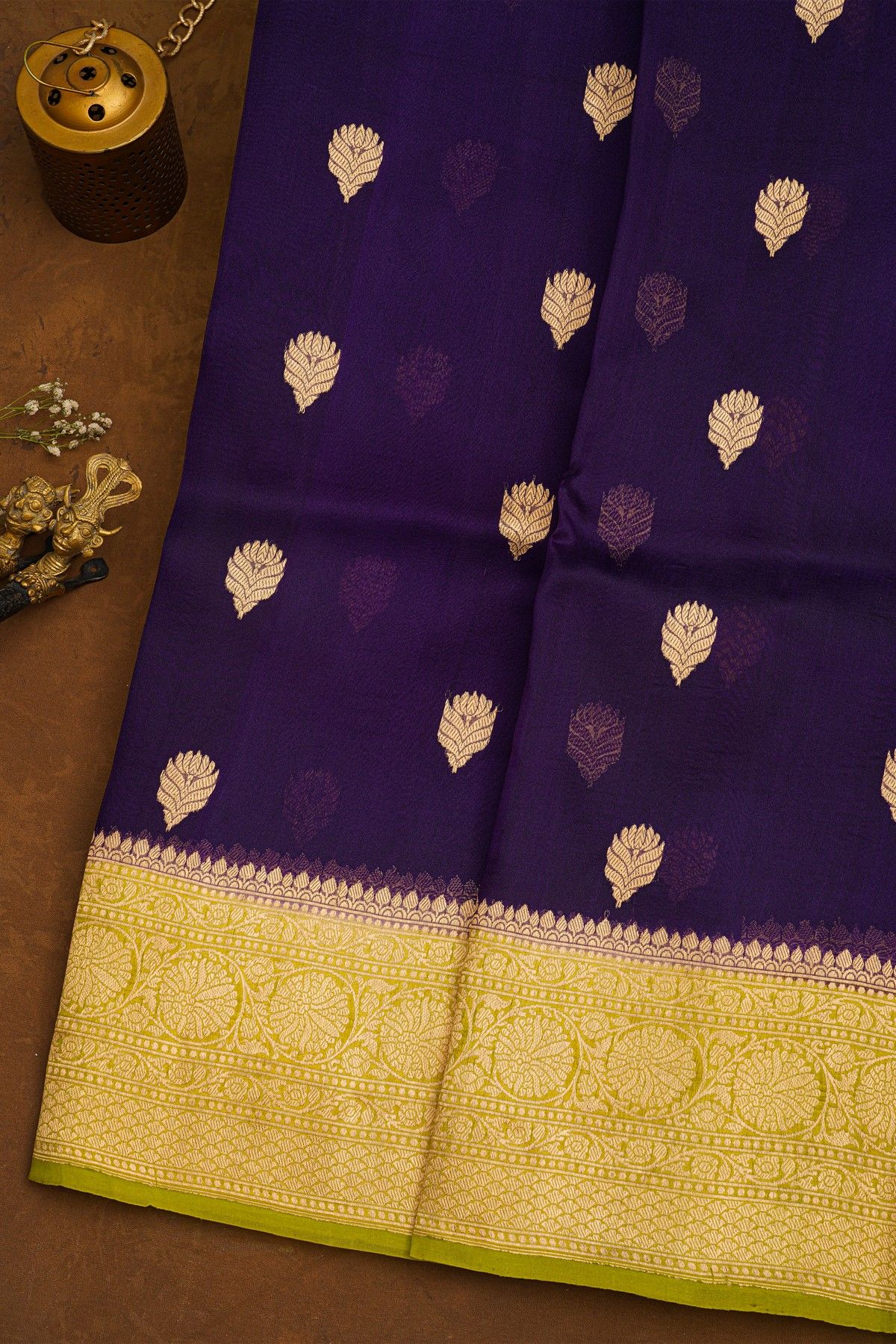 Fancy Organza Purple Saree With Florals And Buttis Body And Contrast Florals And Leaves Border
