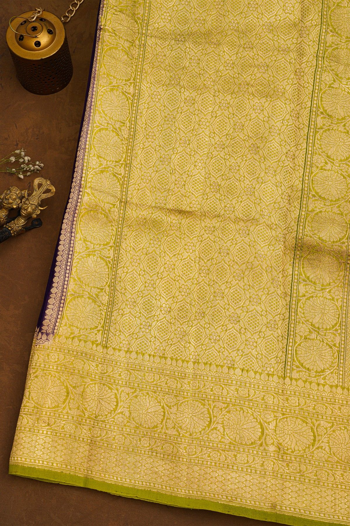 Fancy Organza Purple Saree With Florals And Buttis Body And Contrast Florals And Leaves Border