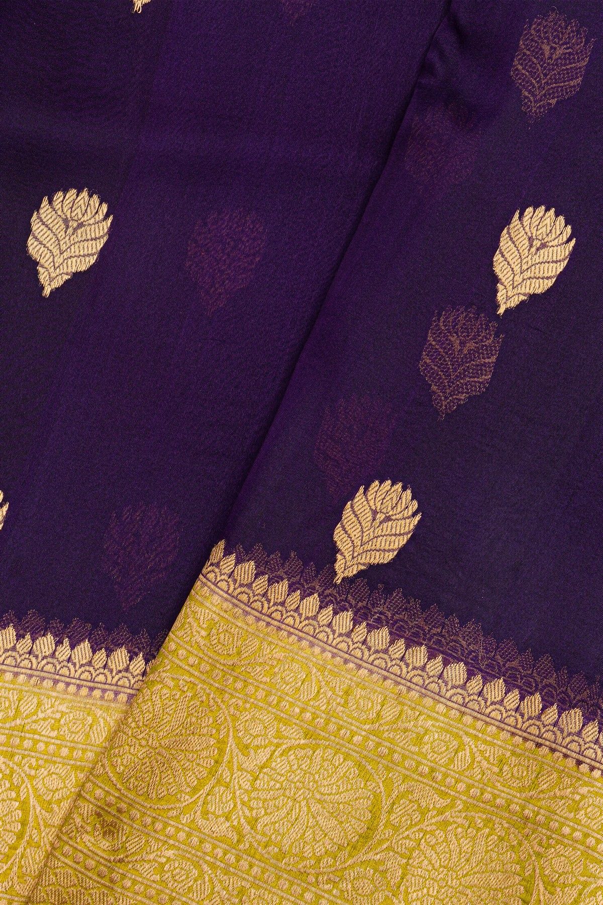 Fancy Organza Purple Saree With Florals And Buttis Body And Contrast Florals And Leaves Border