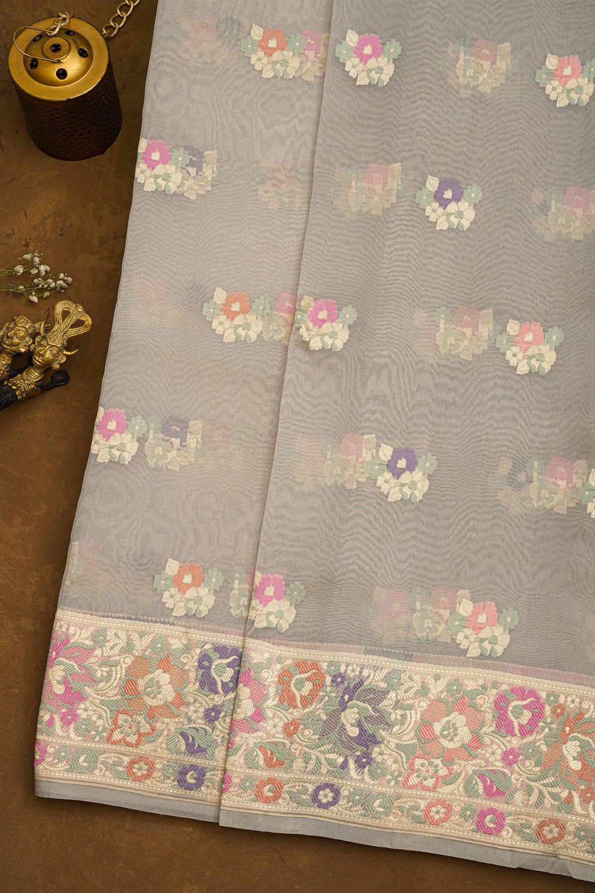 Fancy Organza Grey Saree With Florals And Buttis Body And Self Florals And Leaves Jaal Border